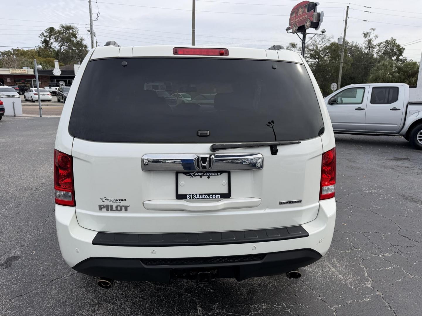 2015 White /Black Honda Pilot Touring 2WD 5-Spd AT with DVD (5FNYF3H96FB) with an 3.5L V6 SOHC 24V engine, 5-Speed Automatic transmission, located at 6112 N Florida Avenue, Tampa, FL, 33604, (888) 521-5131, 27.954929, -82.459534 - $499 DOWN PLUS TAX & TAG. - Photo#3