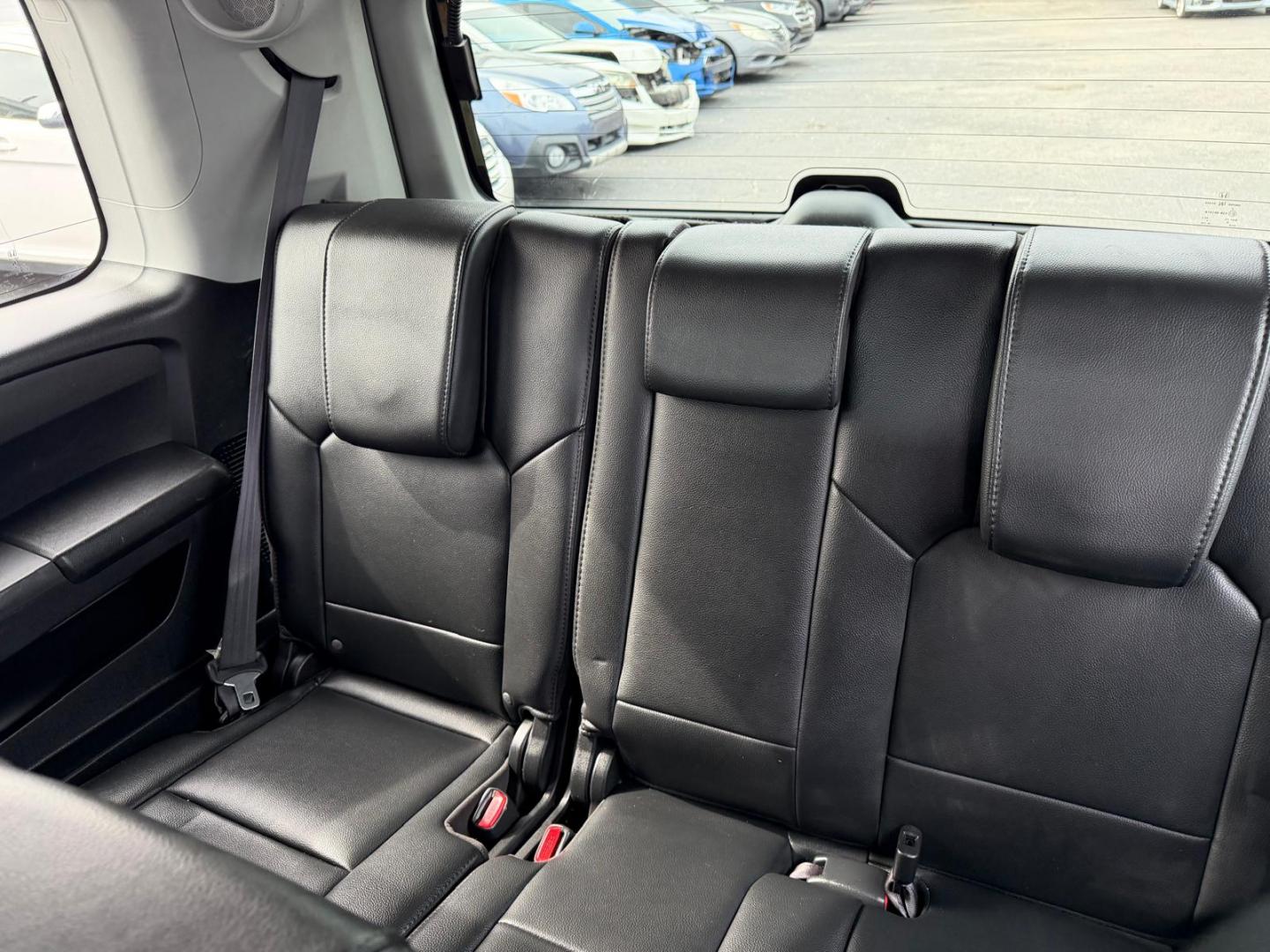 2015 White /Black Honda Pilot Touring 2WD 5-Spd AT with DVD (5FNYF3H96FB) with an 3.5L V6 SOHC 24V engine, 5-Speed Automatic transmission, located at 6112 N Florida Avenue, Tampa, FL, 33604, (888) 521-5131, 27.954929, -82.459534 - $499 DOWN PLUS TAX & TAG. - Photo#8