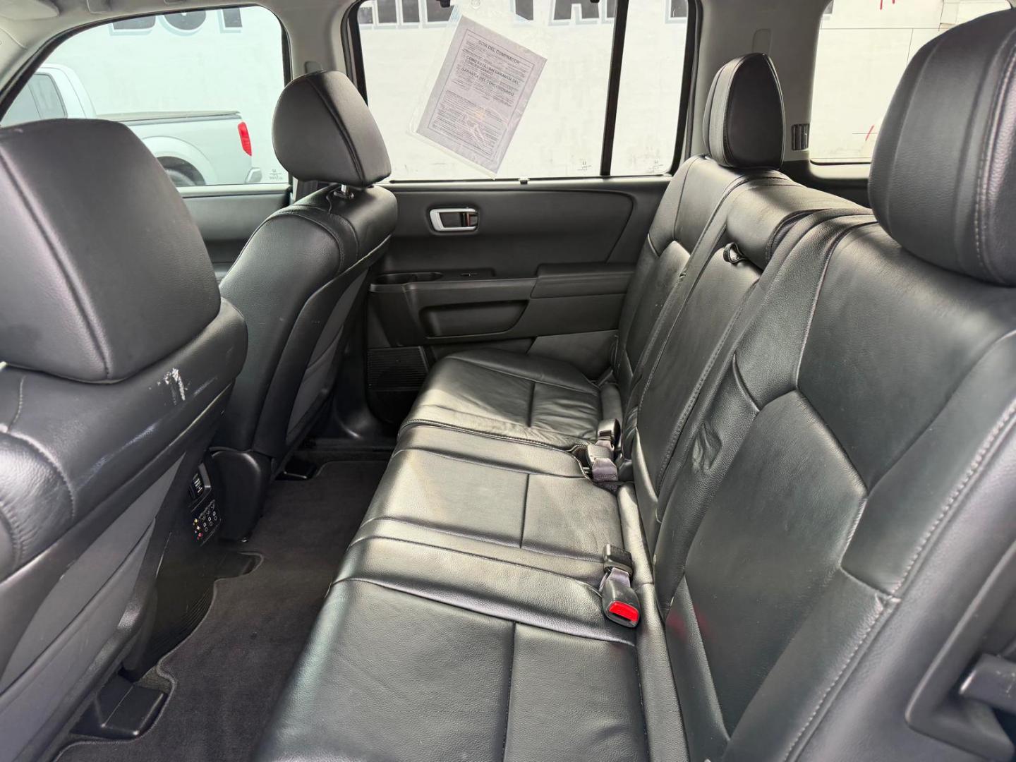 2015 White /Black Honda Pilot Touring 2WD 5-Spd AT with DVD (5FNYF3H96FB) with an 3.5L V6 SOHC 24V engine, 5-Speed Automatic transmission, located at 6112 N Florida Avenue, Tampa, FL, 33604, (888) 521-5131, 27.954929, -82.459534 - $499 DOWN PLUS TAX & TAG. - Photo#9