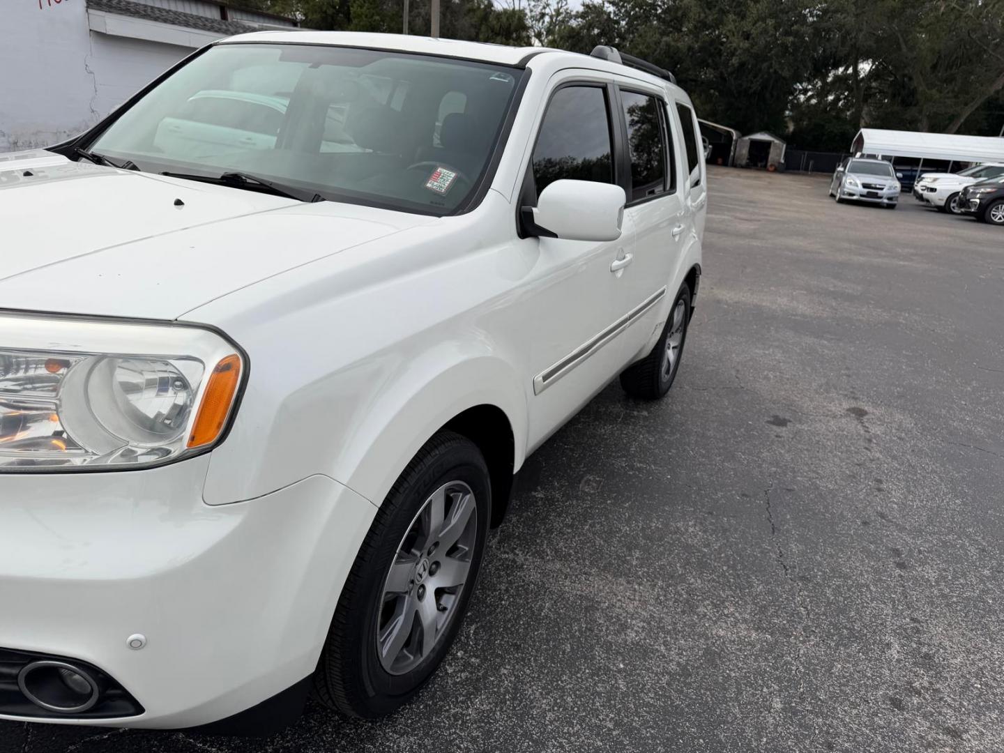 2015 White /Black Honda Pilot Touring 2WD 5-Spd AT with DVD (5FNYF3H96FB) with an 3.5L V6 SOHC 24V engine, 5-Speed Automatic transmission, located at 6112 N Florida Avenue, Tampa, FL, 33604, (888) 521-5131, 27.954929, -82.459534 - $499 DOWN PLUS TAX & TAG. - Photo#2
