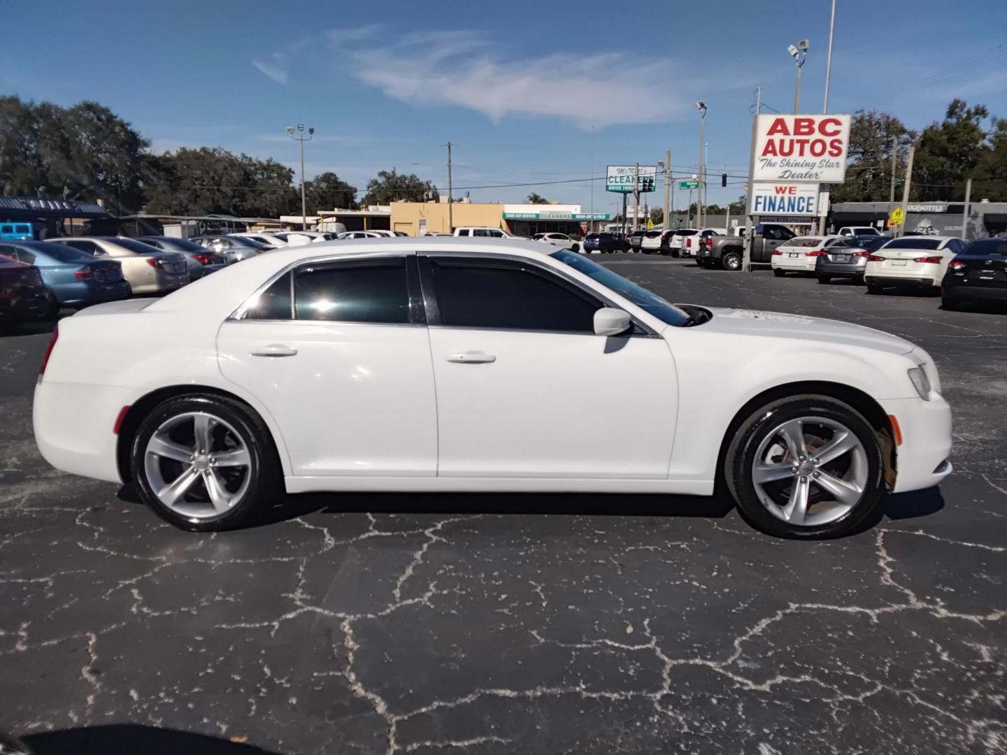 2015 White /Black Chrysler 300 Limited RWD (2C3CCAAG5FH) with an 3.6L V6 SOHC 24V engine, 8-Speed Automatic transmission, located at 6112 N Florida Avenue, Tampa, FL, 33604, (888) 521-5131, 27.954929, -82.459534 - $499 down plus tax & tag. - Photo#4