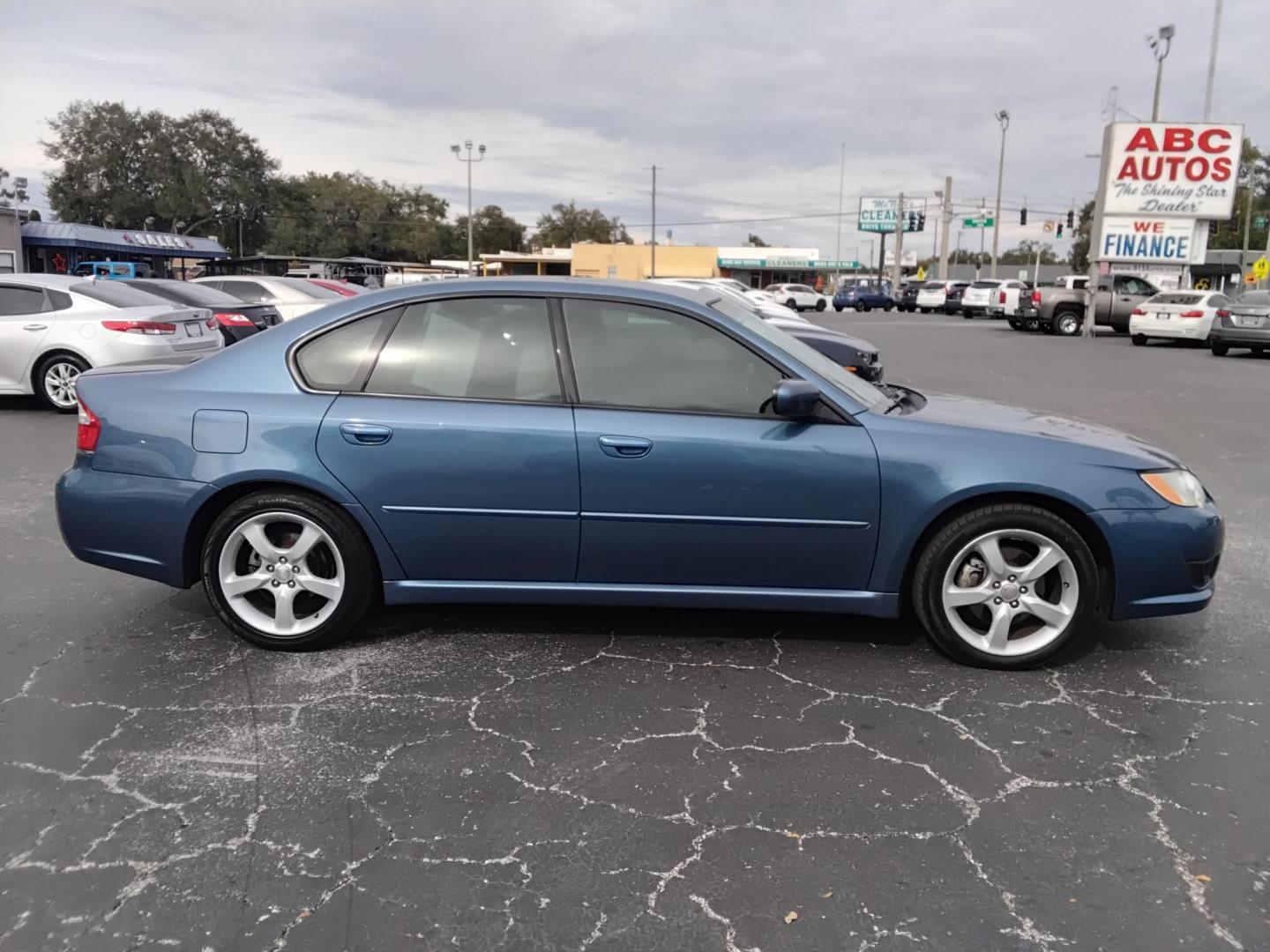 2009 BLUE /Beige Subaru Legacy 2.5i (4S3BL616397) with an 2.5L H4 SOHC 16V engine, located at 6112 N Florida Avenue, Tampa, FL, 33604, (888) 521-5131, 27.954929, -82.459534 - $499 DOWN PLUS TAX $ TAG. - Photo#4