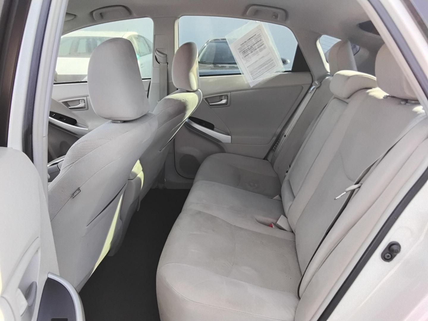 2015 White /Beige Toyota Prius Four (JTDKN3DU6F0) with an 1.8L L4 DOHC 16V HYBRID engine, Continuously Variable Transmission transmission, located at 6112 N Florida Avenue, Tampa, FL, 33604, (888) 521-5131, 27.954929, -82.459534 - $499 down plus tax & tag. - Photo#9