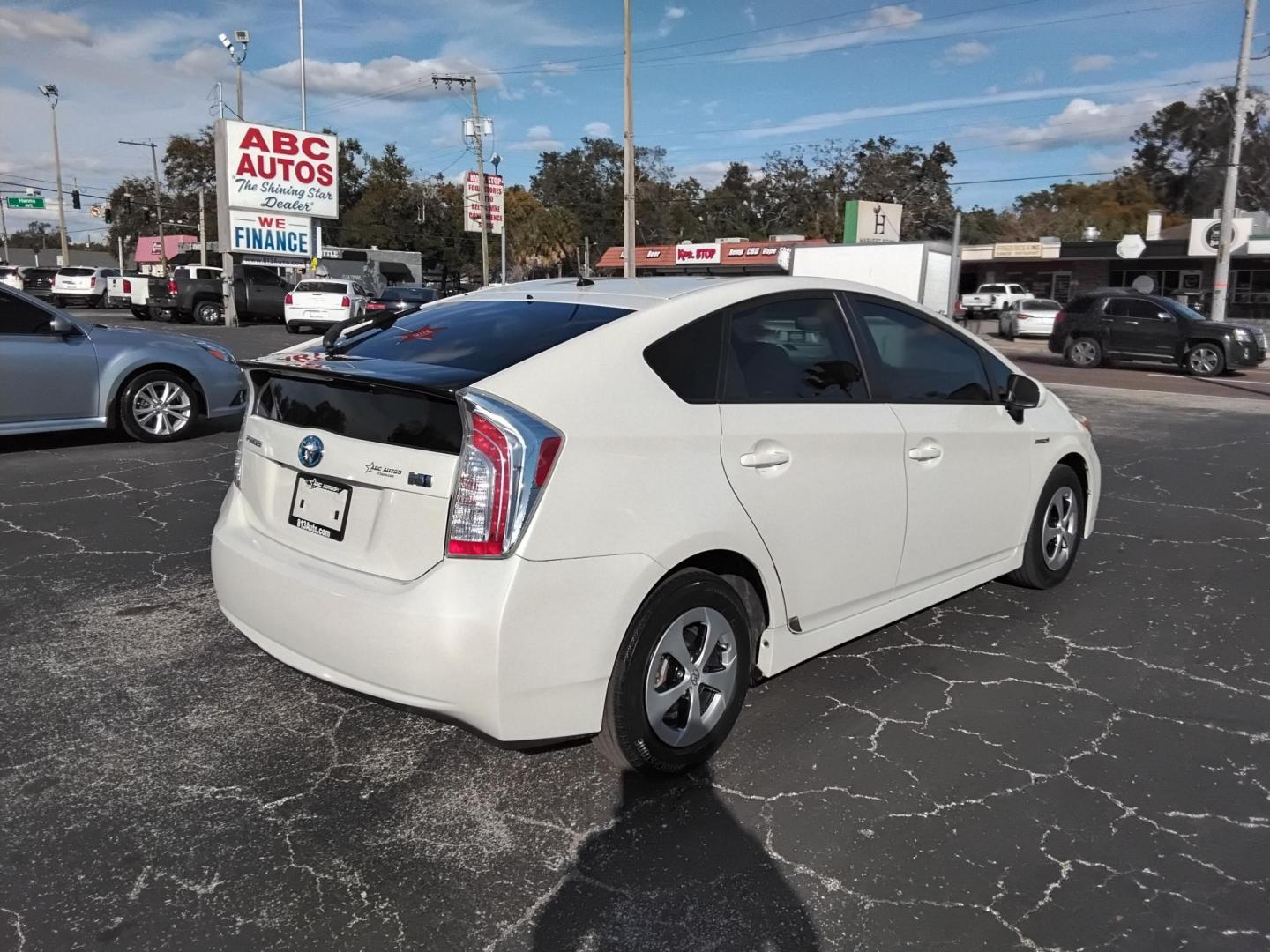 2015 White /Beige Toyota Prius Four (JTDKN3DU6F0) with an 1.8L L4 DOHC 16V HYBRID engine, Continuously Variable Transmission transmission, located at 6112 N Florida Avenue, Tampa, FL, 33604, (888) 521-5131, 27.954929, -82.459534 - $499 down plus tax & tag. - Photo#4