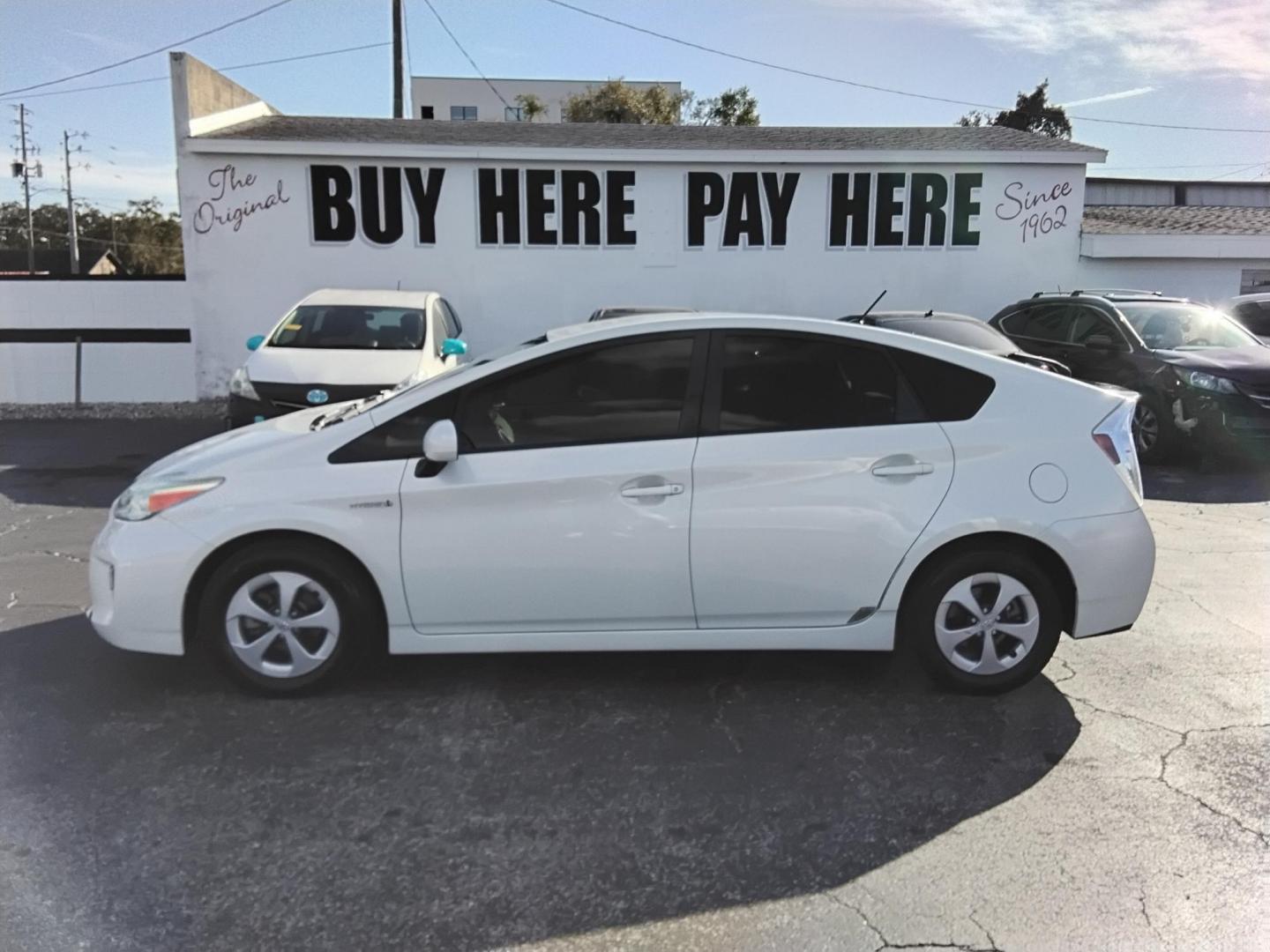 2015 White /Beige Toyota Prius Four (JTDKN3DU6F0) with an 1.8L L4 DOHC 16V HYBRID engine, Continuously Variable Transmission transmission, located at 6112 N Florida Avenue, Tampa, FL, 33604, (888) 521-5131, 27.954929, -82.459534 - $499 down plus tax & tag. - Photo#0