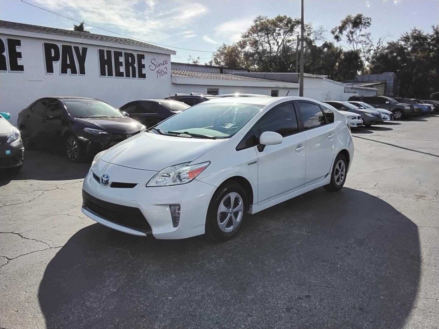 2015 White /Beige Toyota Prius Four (JTDKN3DU6F0) with an 1.8L L4 DOHC 16V HYBRID engine, Continuously Variable Transmission transmission, located at 6112 N Florida Avenue, Tampa, FL, 33604, (888) 521-5131, 27.954929, -82.459534 - $499 down plus tax & tag. - Photo#1