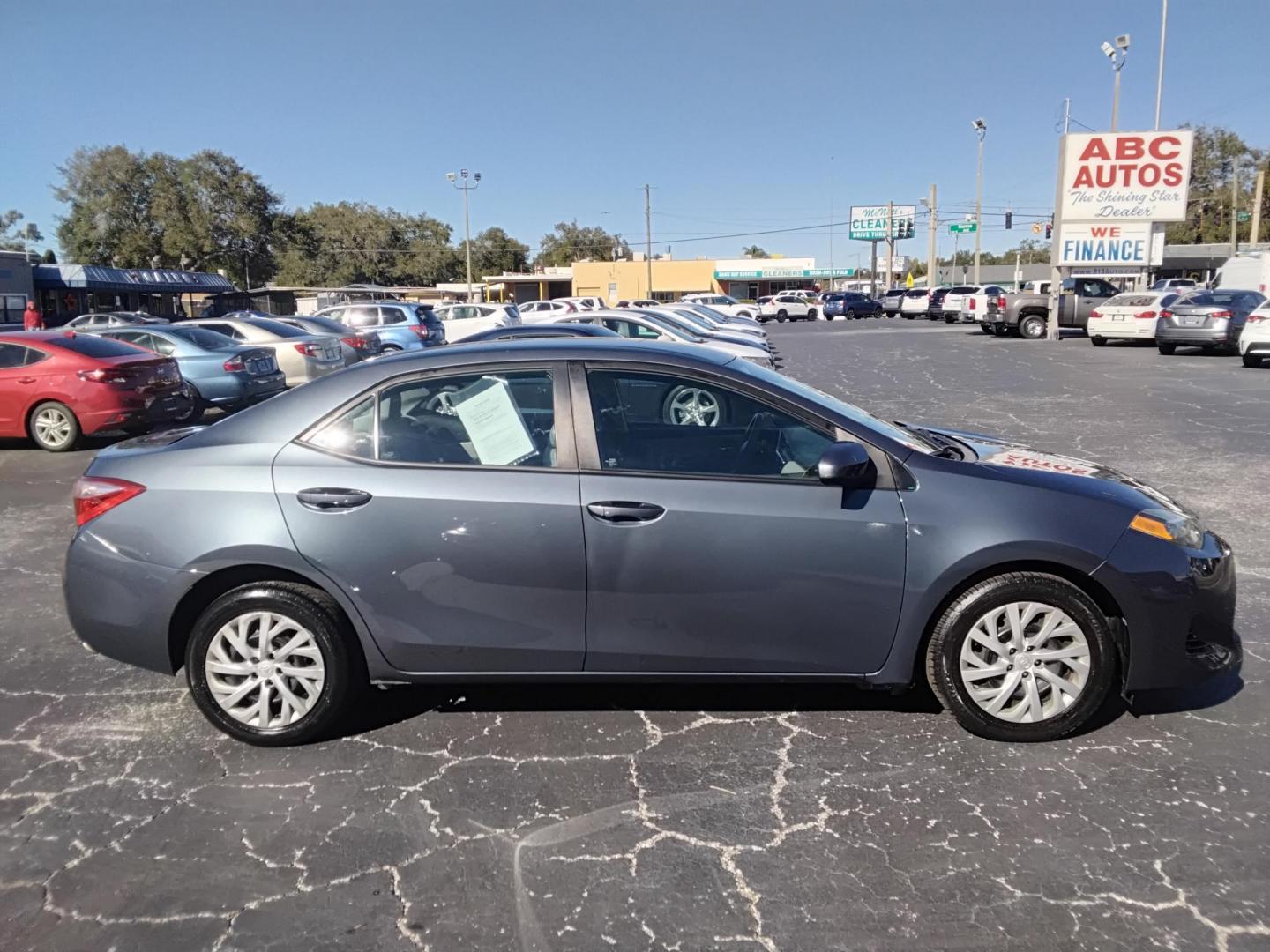 2017 GRAY /grey Toyota Corolla L CVT (2T1BURHE1HC) with an 1.8L L4 DOHC 16V engine, CVT transmission, located at 6112 N Florida Avenue, Tampa, FL, 33604, (888) 521-5131, 27.954929, -82.459534 - $499 down plus tax & tag. - Photo#3