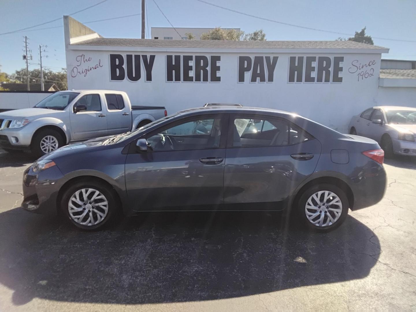 2017 GRAY /grey Toyota Corolla L CVT (2T1BURHE1HC) with an 1.8L L4 DOHC 16V engine, CVT transmission, located at 6112 N Florida Avenue, Tampa, FL, 33604, (888) 521-5131, 27.954929, -82.459534 - $499 down plus tax & tag. - Photo#0