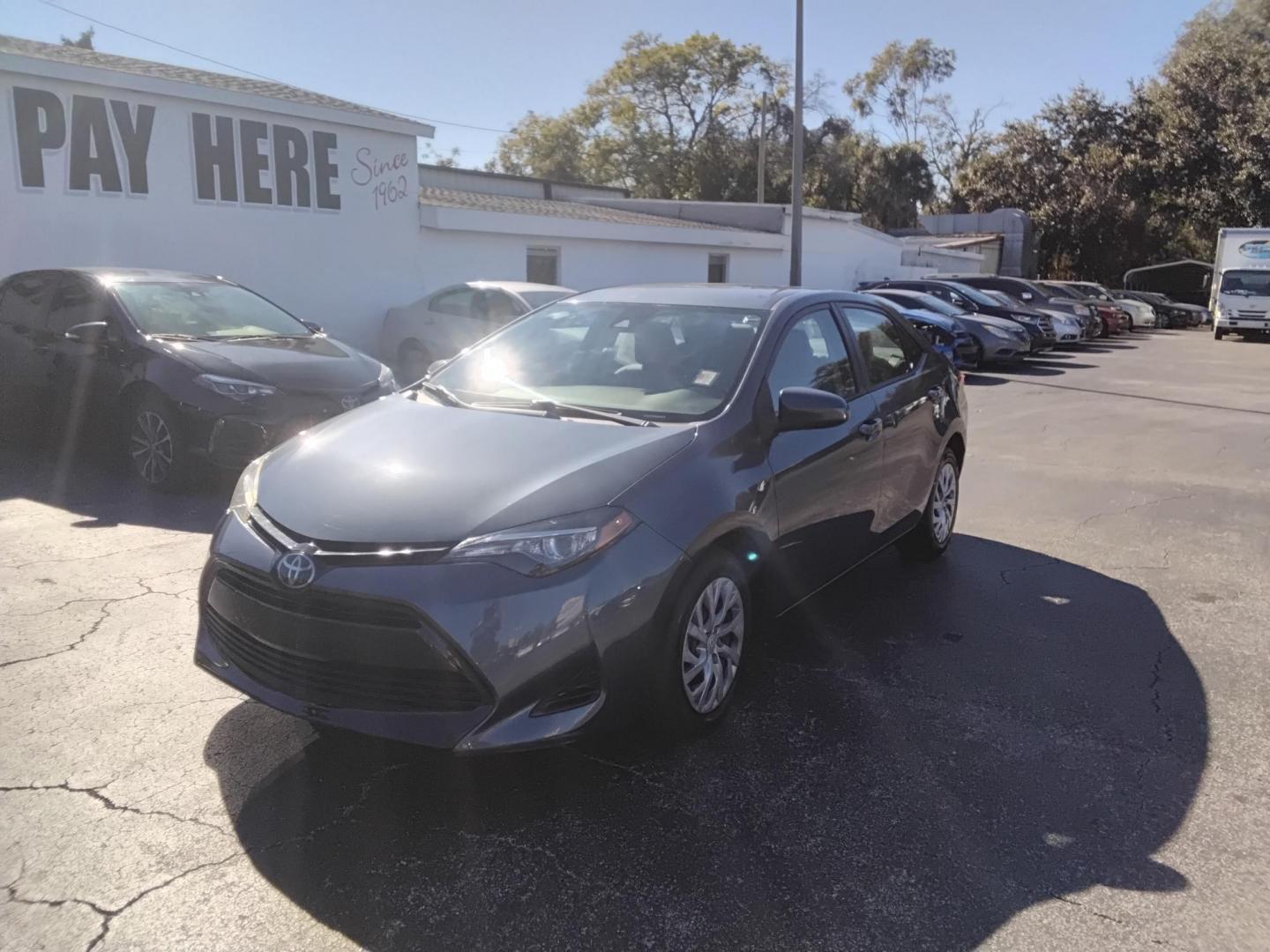 2017 GRAY /grey Toyota Corolla L CVT (2T1BURHE1HC) with an 1.8L L4 DOHC 16V engine, CVT transmission, located at 6112 N Florida Avenue, Tampa, FL, 33604, (888) 521-5131, 27.954929, -82.459534 - $499 down plus tax & tag. - Photo#2