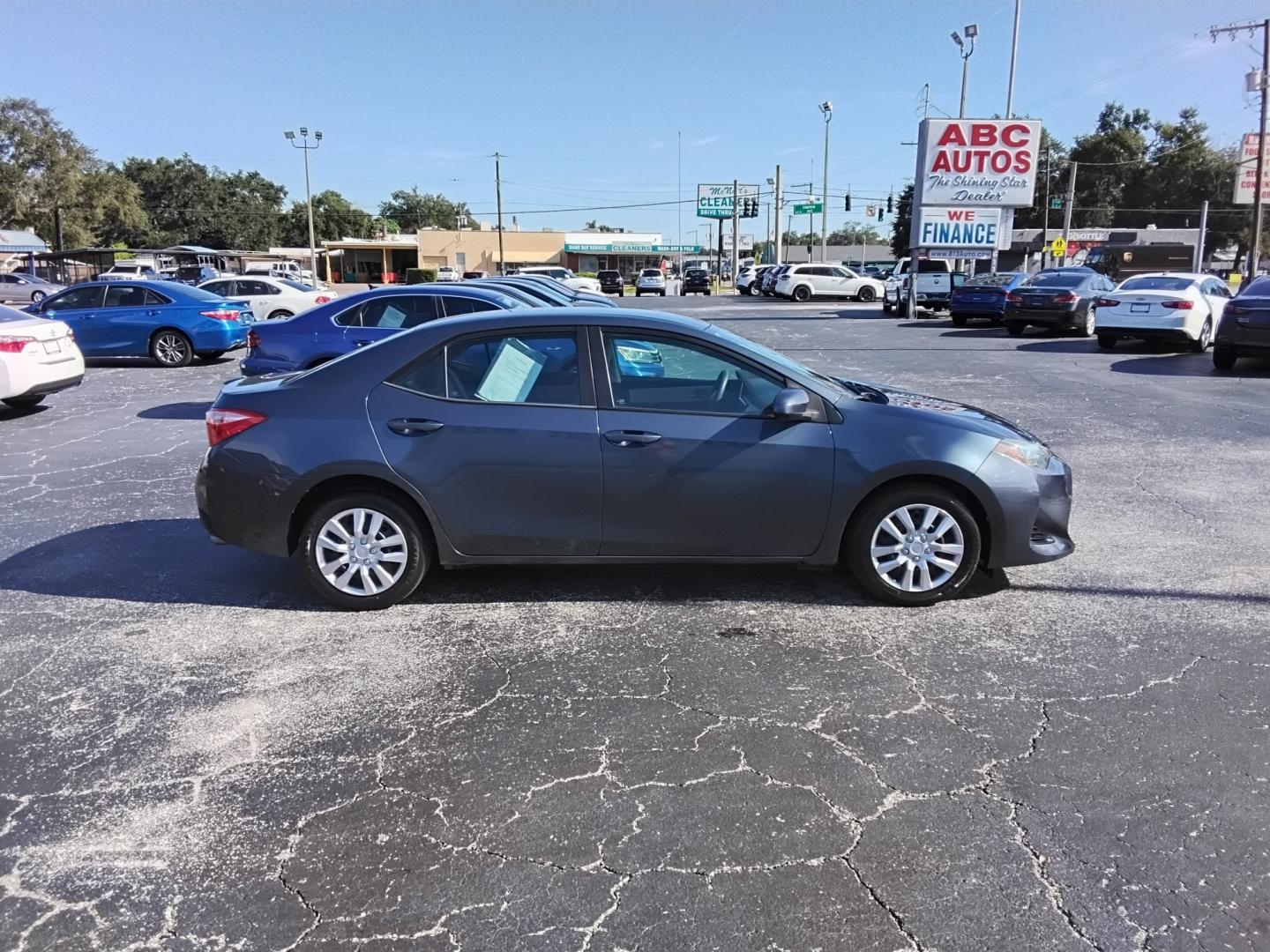 2017 GRAY /grey Toyota Corolla L CVT (2T1BURHE1HC) with an 1.8L L4 DOHC 16V engine, CVT transmission, located at 6112 N Florida Avenue, Tampa, FL, 33604, (888) 521-5131, 27.954929, -82.459534 - $499 down plus tax & tag.- Photo#1