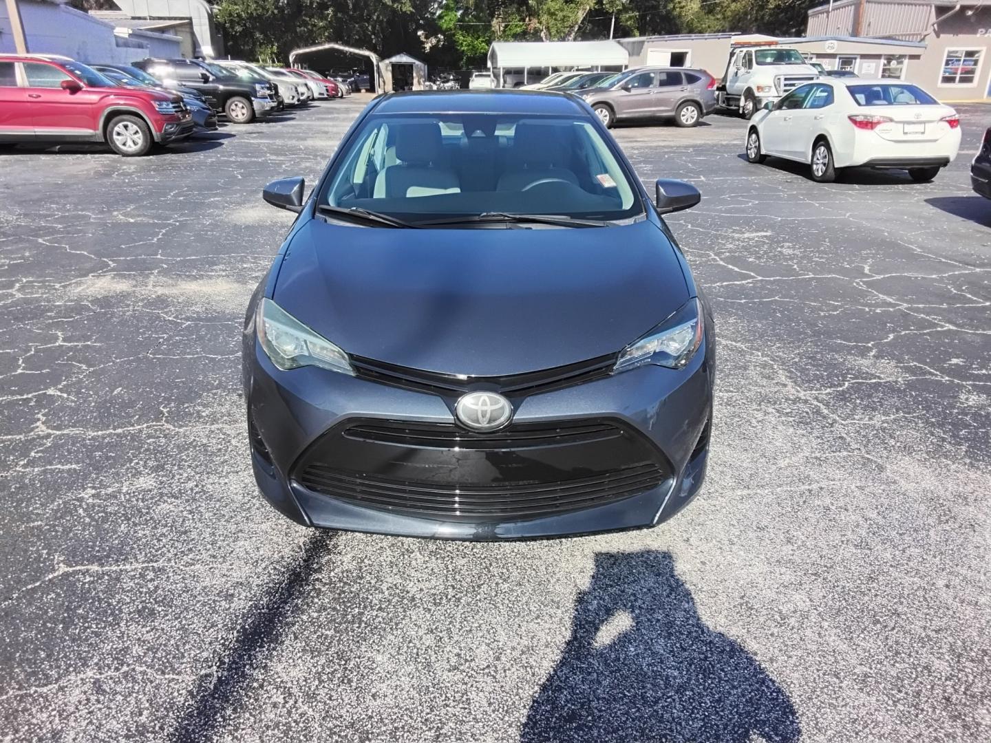 2017 GRAY /grey Toyota Corolla L CVT (2T1BURHE1HC) with an 1.8L L4 DOHC 16V engine, CVT transmission, located at 6112 N Florida Avenue, Tampa, FL, 33604, (888) 521-5131, 27.954929, -82.459534 - $499 down plus tax & tag.- Photo#2