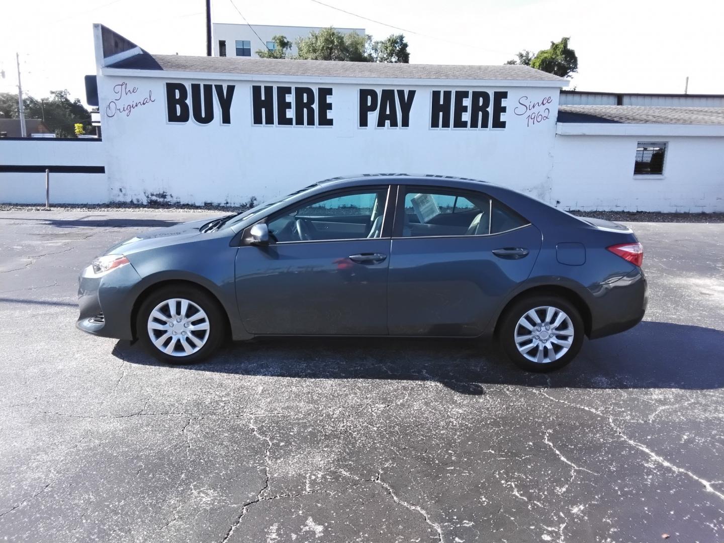 2017 GRAY /grey Toyota Corolla L CVT (2T1BURHE1HC) with an 1.8L L4 DOHC 16V engine, CVT transmission, located at 6112 N Florida Avenue, Tampa, FL, 33604, (888) 521-5131, 27.954929, -82.459534 - $499 down plus tax & tag.- Photo#0