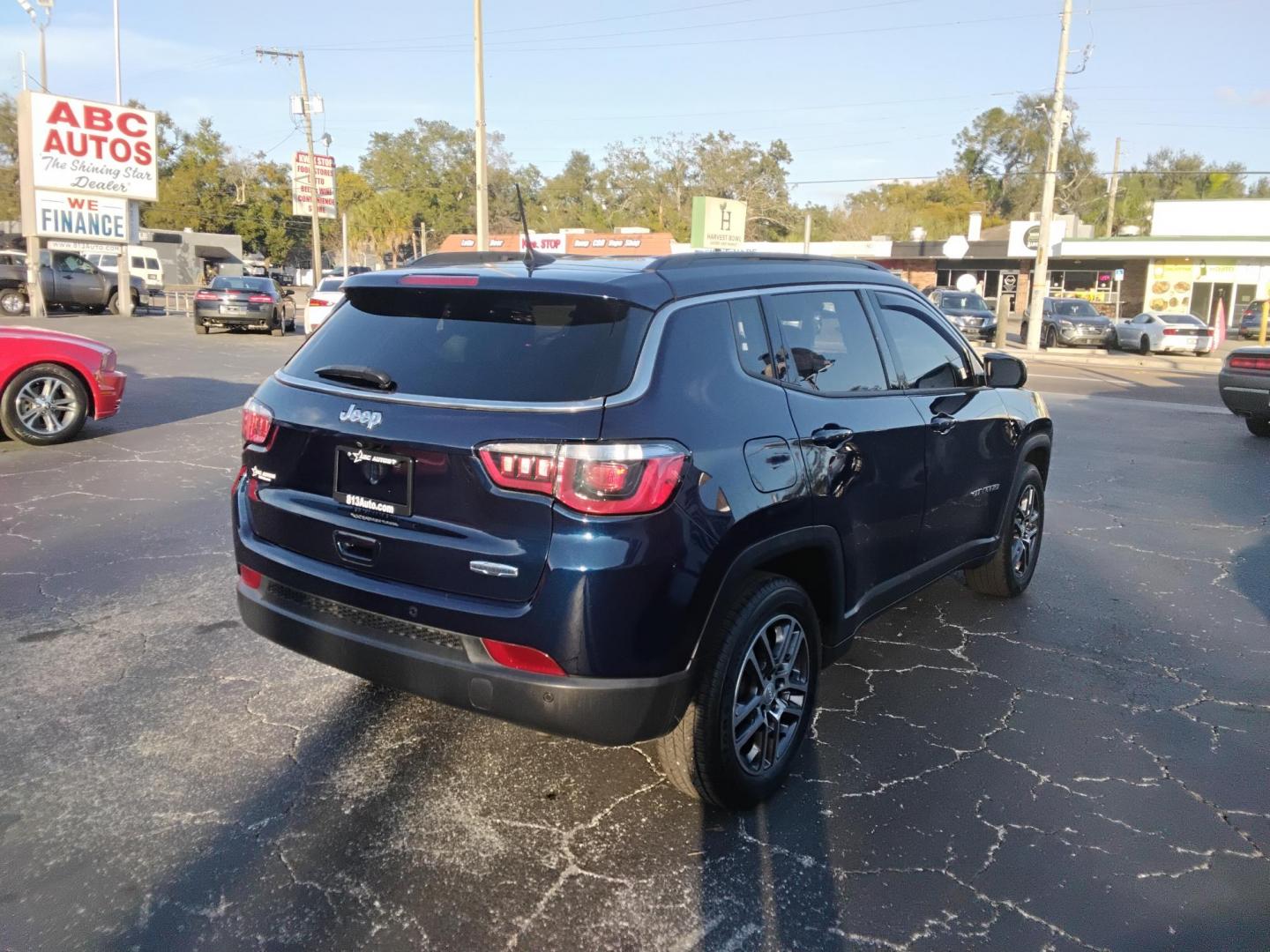 2017 BLACK /Black Jeep Compass Sport FWD (3C4NJCBB8HT) with an 2.4L L4 DOHC 16V engine, located at 6112 N Florida Avenue, Tampa, FL, 33604, (888) 521-5131, 27.954929, -82.459534 - $499 down plus tax & tag. - Photo#5