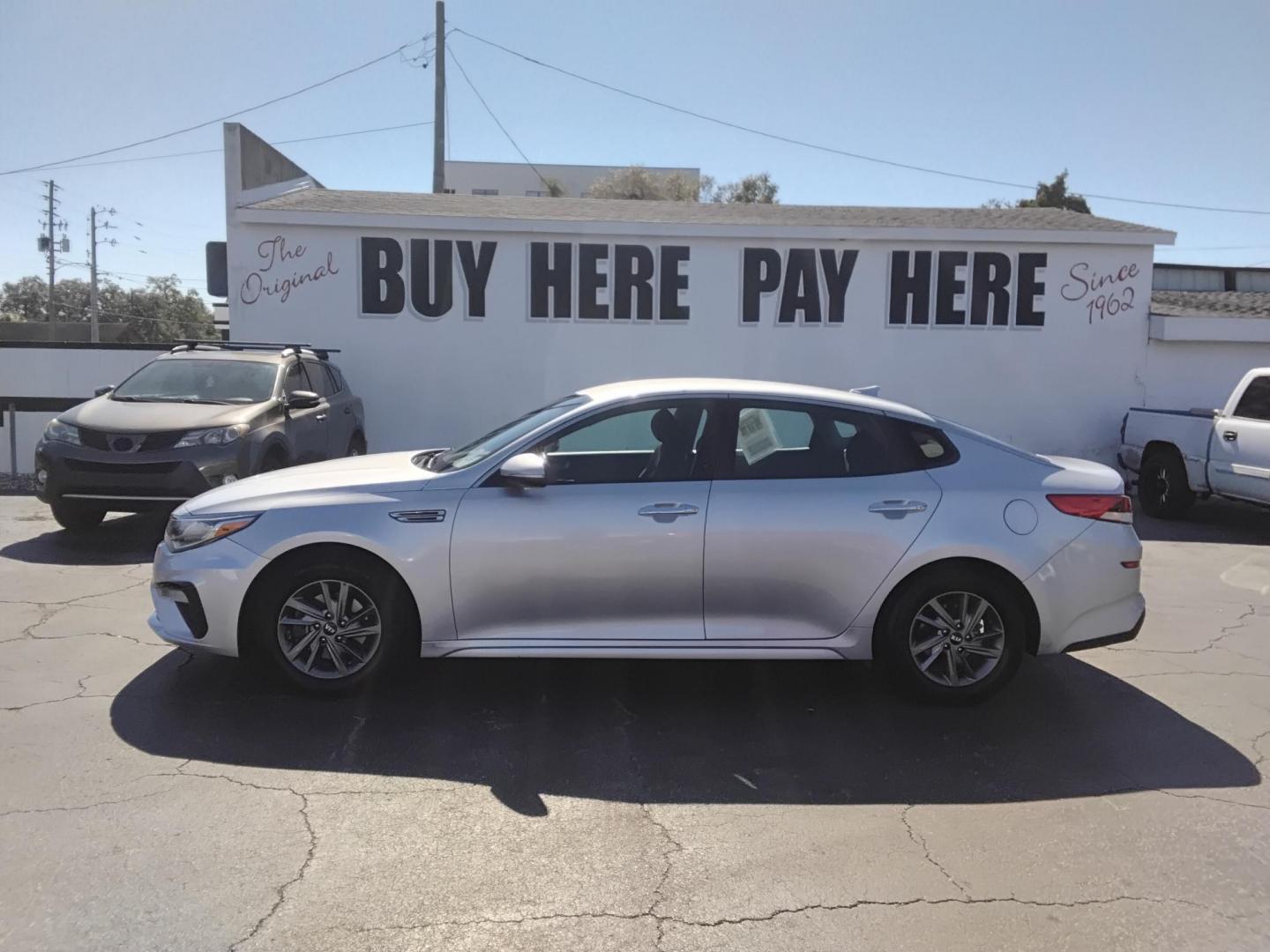 2019 SILVER /Grey Kia Optima LX (5XXGT4L31KG) with an 2.4L L4 DOHC 16V engine, 6A transmission, located at 6112 N Florida Avenue, Tampa, FL, 33604, (888) 521-5131, 27.954929, -82.459534 - $499 down plus tax & tag.- Photo#0