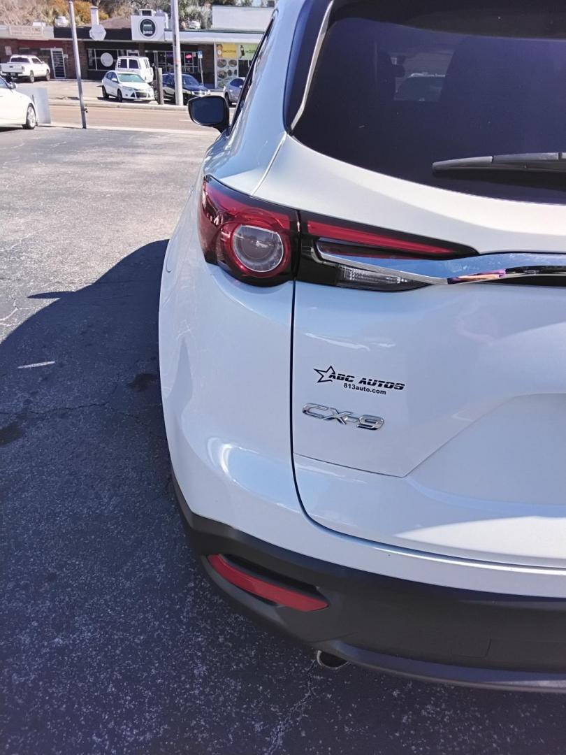 2016 White /Grey Mazda CX-9 Sport FWD (JM3TCABY9G0) with an 2.5L L4 DOHC 16V engine, 6A transmission, located at 6112 N Florida Avenue, Tampa, FL, 33604, (888) 521-5131, 27.954929, -82.459534 - $499 DOWN PLUS TAX & TAG.- Photo#12