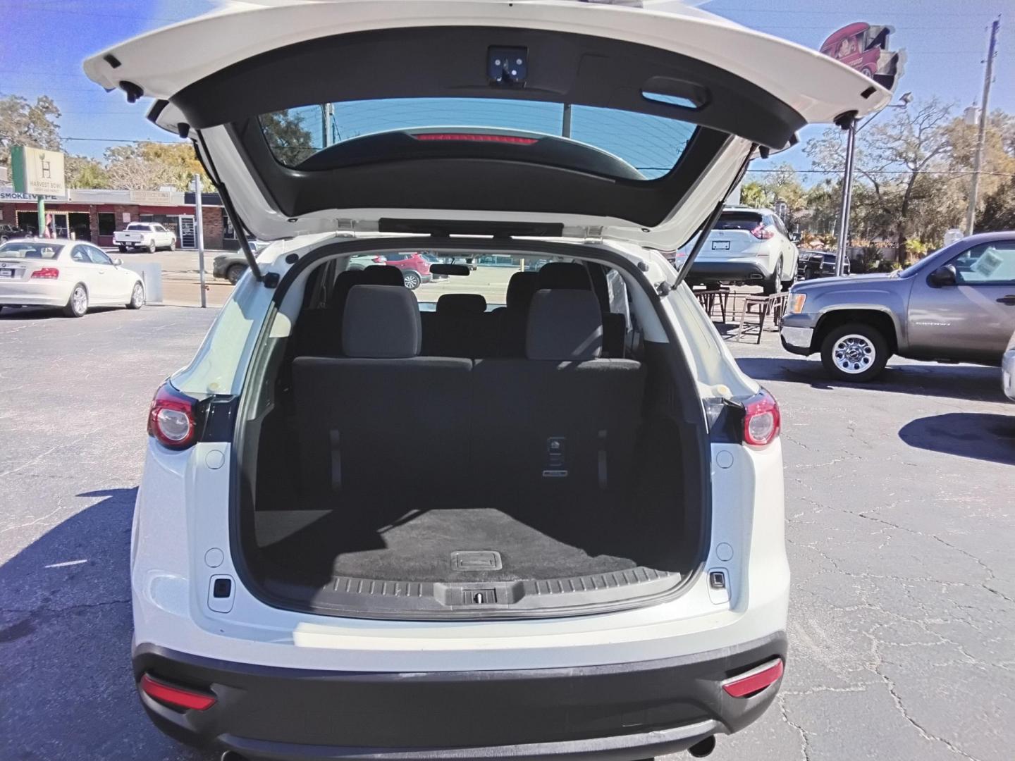 2016 White /Grey Mazda CX-9 Sport FWD (JM3TCABY9G0) with an 2.5L L4 DOHC 16V engine, 6A transmission, located at 6112 N Florida Avenue, Tampa, FL, 33604, (888) 521-5131, 27.954929, -82.459534 - $499 DOWN PLUS TAX & TAG.- Photo#18