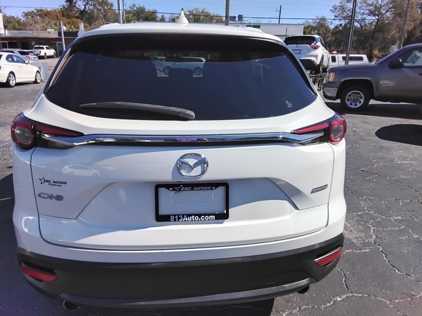 2016 White /Grey Mazda CX-9 Sport FWD (JM3TCABY9G0) with an 2.5L L4 DOHC 16V engine, 6A transmission, located at 6112 N Florida Avenue, Tampa, FL, 33604, (888) 521-5131, 27.954929, -82.459534 - $499 DOWN PLUS TAX & TAG.- Photo#17