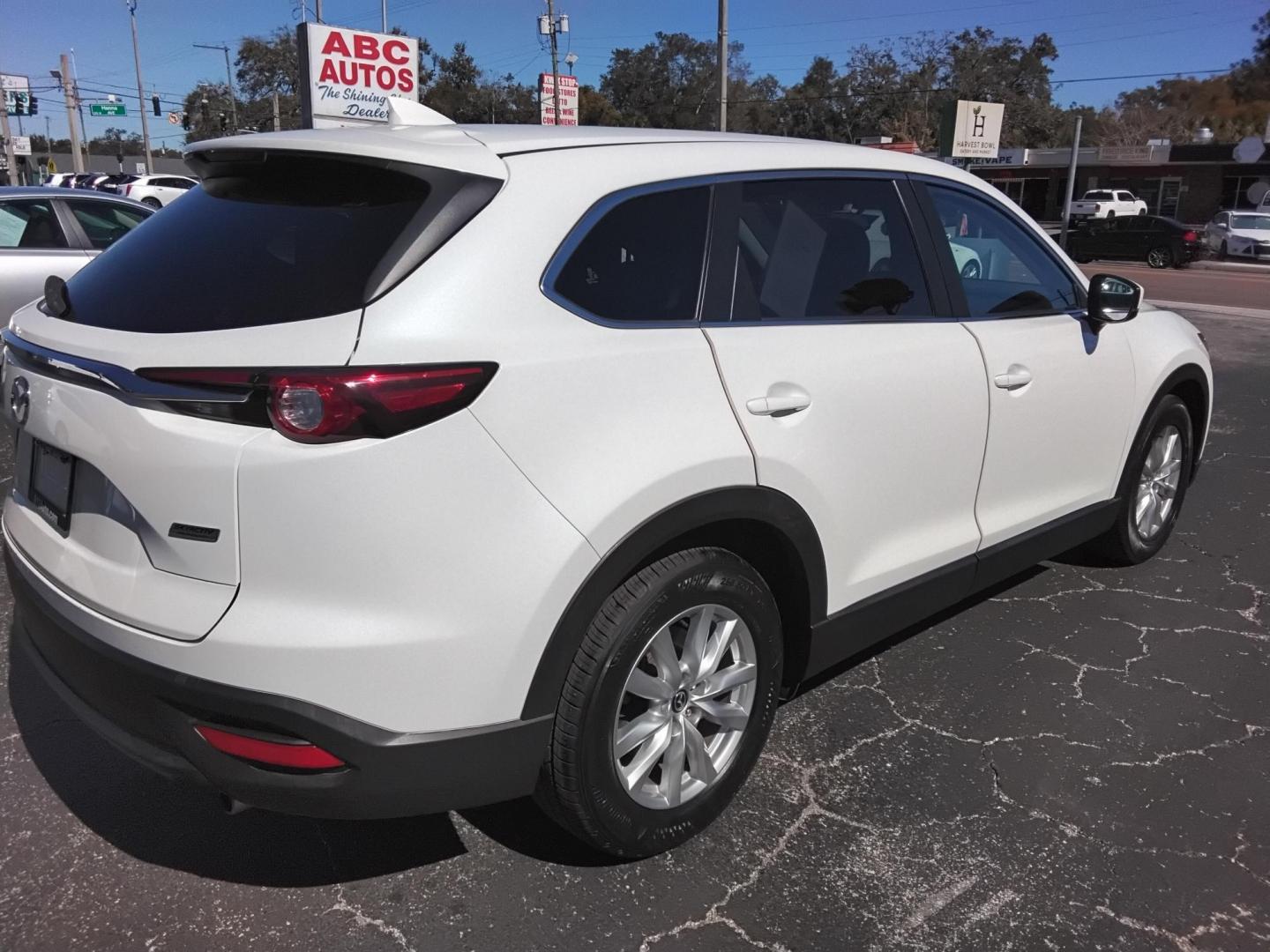 2016 White /Grey Mazda CX-9 Sport FWD (JM3TCABY9G0) with an 2.5L L4 DOHC 16V engine, 6A transmission, located at 6112 N Florida Avenue, Tampa, FL, 33604, (888) 521-5131, 27.954929, -82.459534 - $499 DOWN PLUS TAX & TAG.- Photo#4