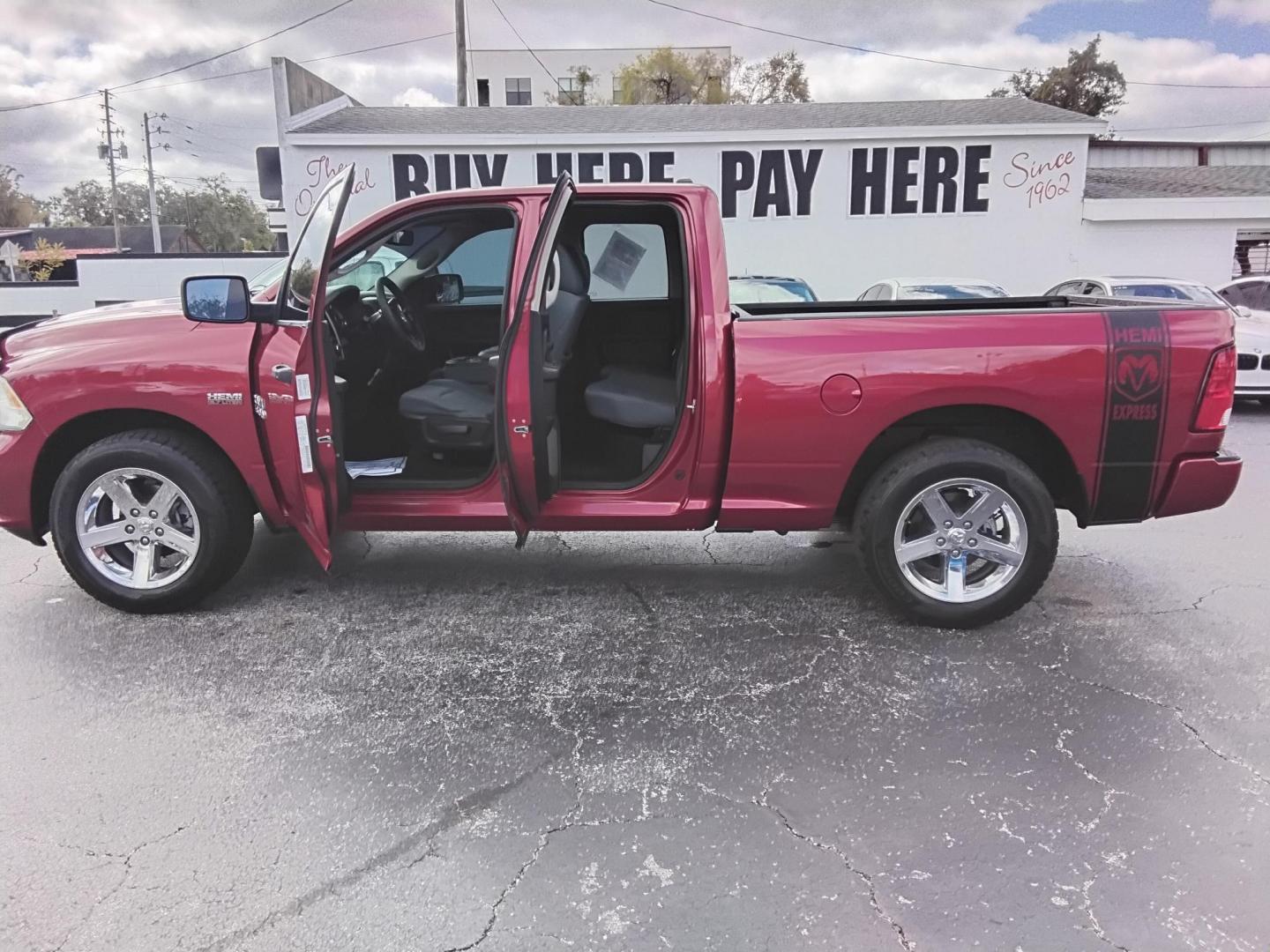 2013 RED /Grey RAM 1500 Tradesman Quad Cab 2WD (1C6RR6FT0DS) with an 5.7L V8 OHV 16V engine, 6-Speed Automatic transmission, located at 6112 N Florida Avenue, Tampa, FL, 33604, (888) 521-5131, 27.954929, -82.459534 - $499 DOWN PLUS TAX & TAG. - Photo#1
