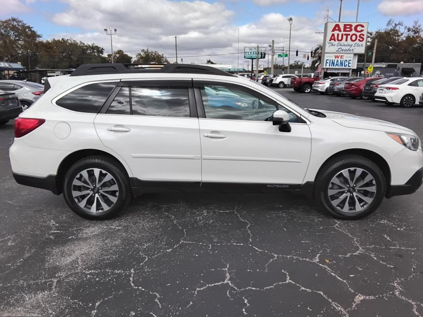 2017 White /Black Subaru Outback 2.5i Limited (4S4BSANC1H3) with an 2.5L H4 DOHC 16V engine, CVT transmission, located at 6112 N Florida Avenue, Tampa, FL, 33604, (888) 521-5131, 27.954929, -82.459534 - $499 DOWN PLUS TAX & TAG.- Photo#5