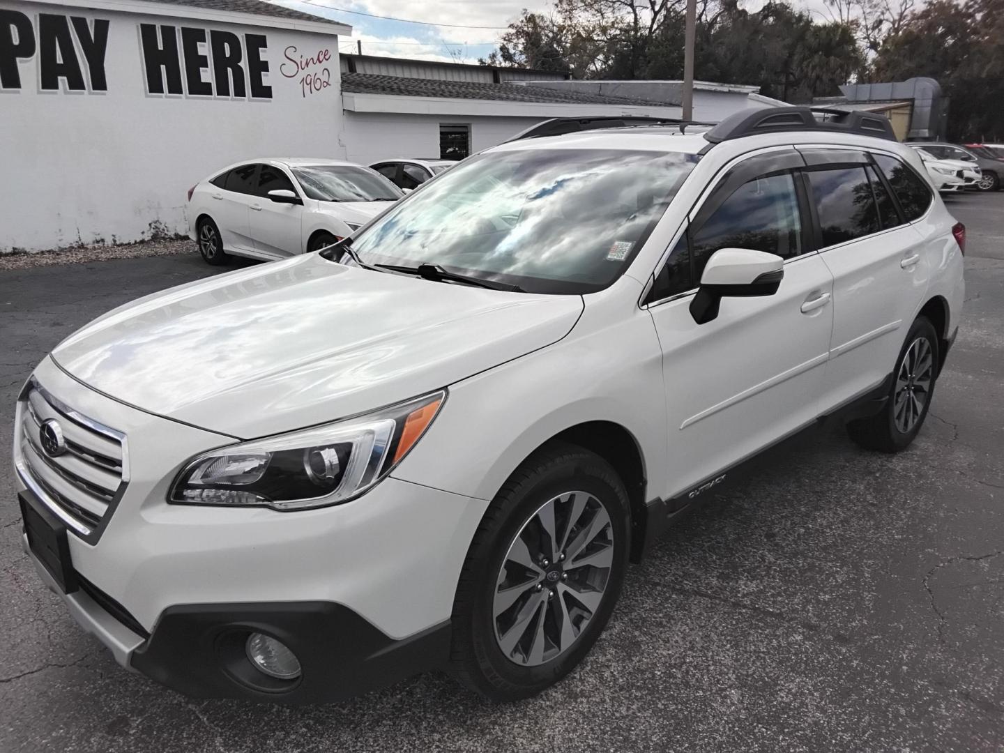 2017 White /Black Subaru Outback 2.5i Limited (4S4BSANC1H3) with an 2.5L H4 DOHC 16V engine, CVT transmission, located at 6112 N Florida Avenue, Tampa, FL, 33604, (888) 521-5131, 27.954929, -82.459534 - $499 DOWN PLUS TAX & TAG.- Photo#2