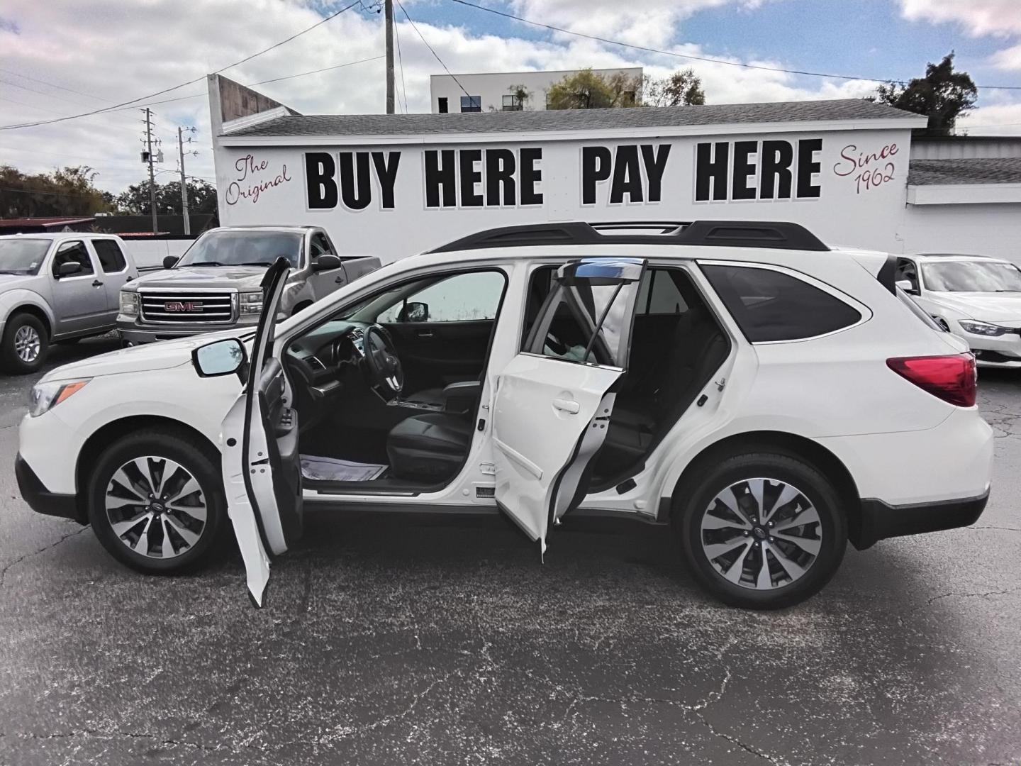 2017 White /Black Subaru Outback 2.5i Limited (4S4BSANC1H3) with an 2.5L H4 DOHC 16V engine, CVT transmission, located at 6112 N Florida Avenue, Tampa, FL, 33604, (888) 521-5131, 27.954929, -82.459534 - $499 DOWN PLUS TAX & TAG.- Photo#1