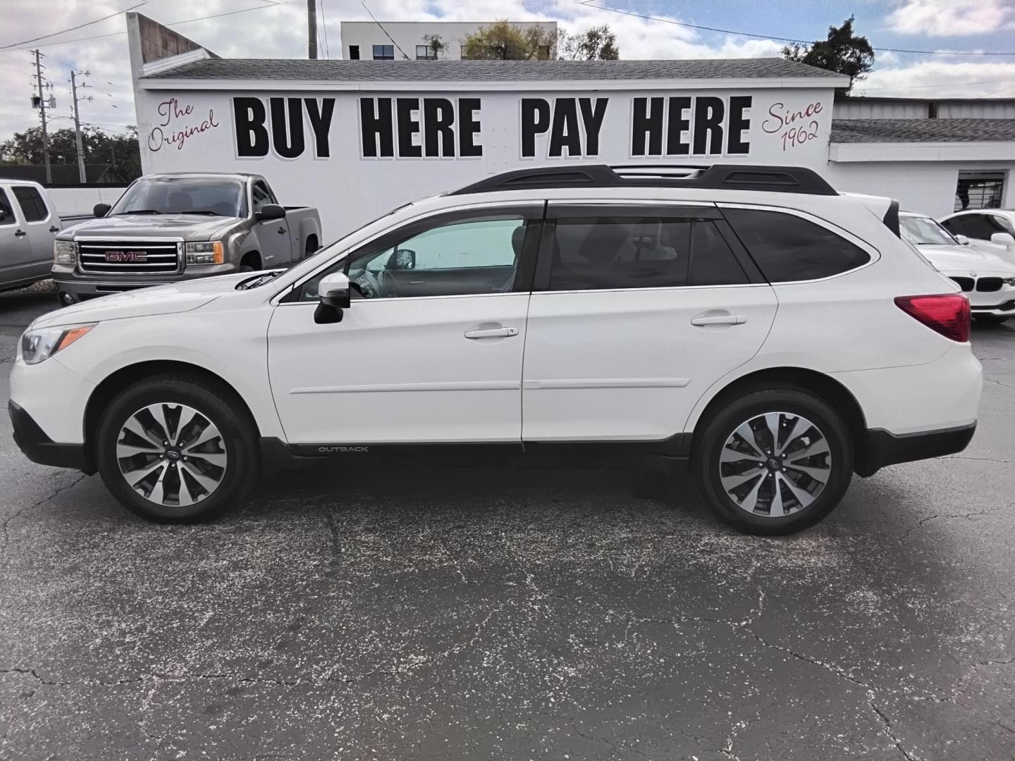 2017 White /Black Subaru Outback 2.5i Limited (4S4BSANC1H3) with an 2.5L H4 DOHC 16V engine, CVT transmission, located at 6112 N Florida Avenue, Tampa, FL, 33604, (888) 521-5131, 27.954929, -82.459534 - $499 DOWN PLUS TAX & TAG.- Photo#0