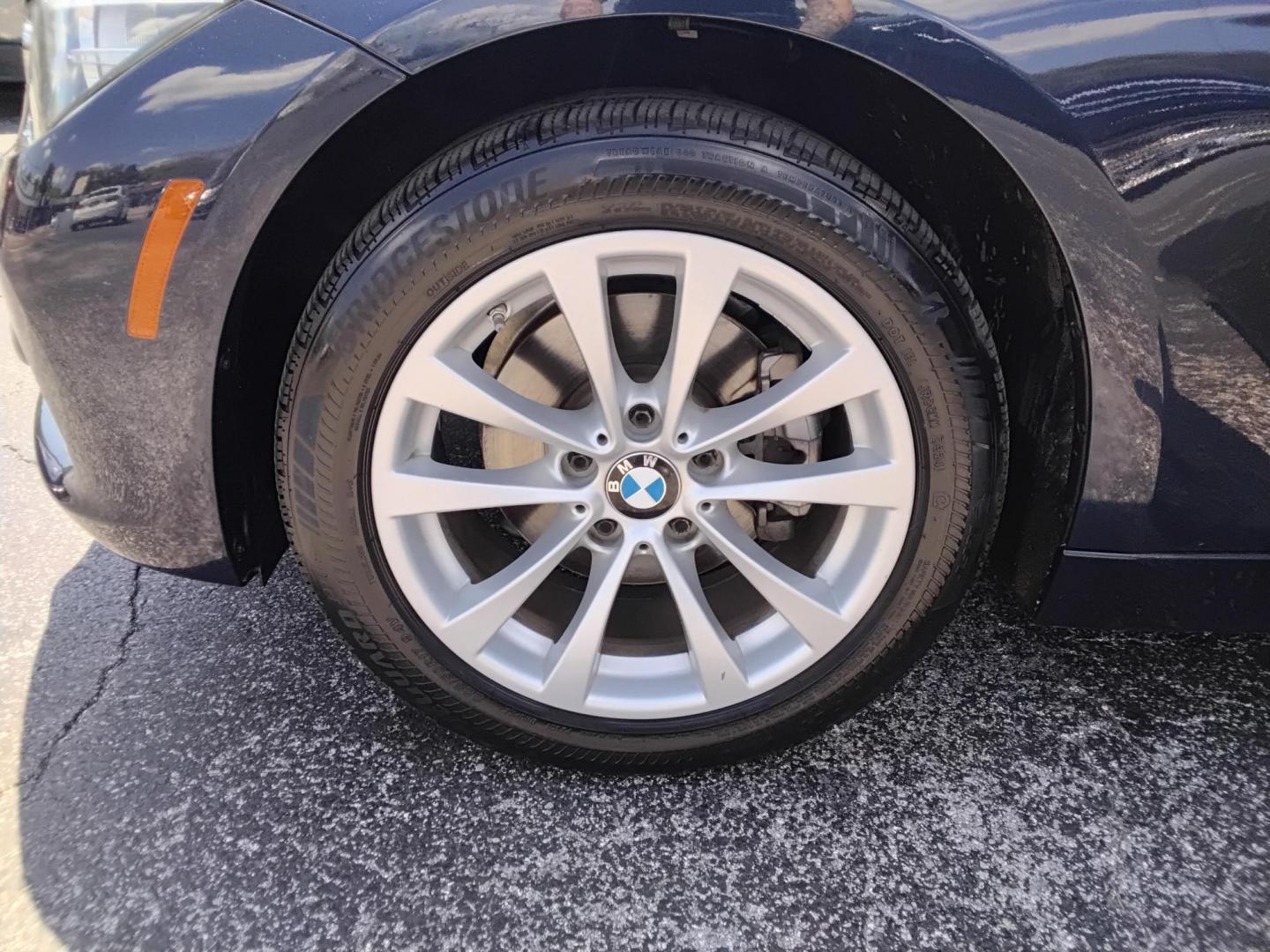 2017 BLUE /Beige BMW 3-Series 320i Sedan (WBA8A9C35HA) with an 2.0L L4 DOHC 16V engine, 8A transmission, located at 6112 N Florida Avenue, Tampa, FL, 33604, (888) 521-5131, 27.954929, -82.459534 - $499 down plus tax & tag. - Photo#5