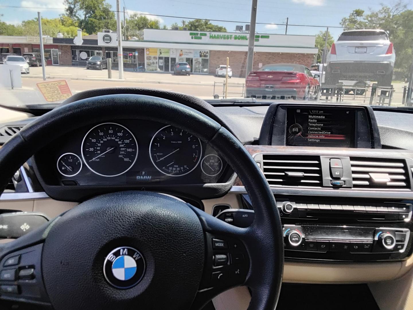 2017 BLUE /Beige BMW 3-Series 320i Sedan (WBA8A9C35HA) with an 2.0L L4 DOHC 16V engine, 8A transmission, located at 6112 N Florida Avenue, Tampa, FL, 33604, (888) 521-5131, 27.954929, -82.459534 - $499 down plus tax & tag. - Photo#6