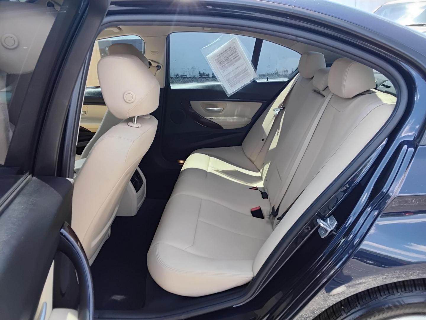 2017 BLUE /Beige BMW 3-Series 320i Sedan (WBA8A9C35HA) with an 2.0L L4 DOHC 16V engine, 8A transmission, located at 6112 N Florida Avenue, Tampa, FL, 33604, (888) 521-5131, 27.954929, -82.459534 - $499 down plus tax & tag. - Photo#8