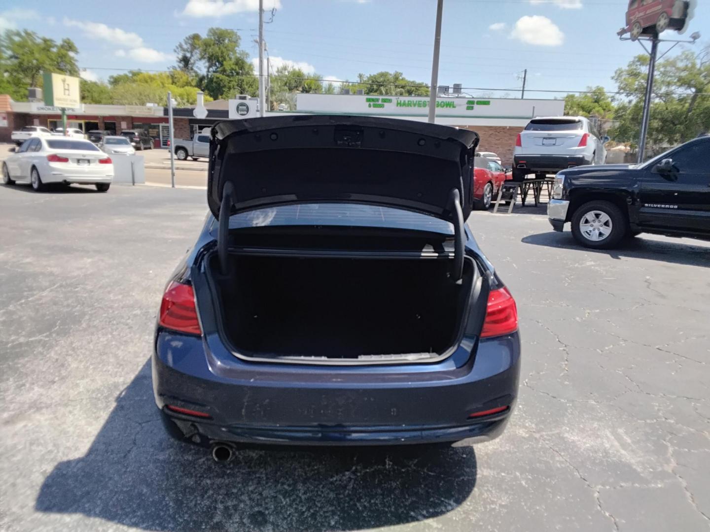 2017 BLUE /Beige BMW 3-Series 320i Sedan (WBA8A9C35HA) with an 2.0L L4 DOHC 16V engine, 8A transmission, located at 6112 N Florida Avenue, Tampa, FL, 33604, (888) 521-5131, 27.954929, -82.459534 - $499 down plus tax & tag. - Photo#4