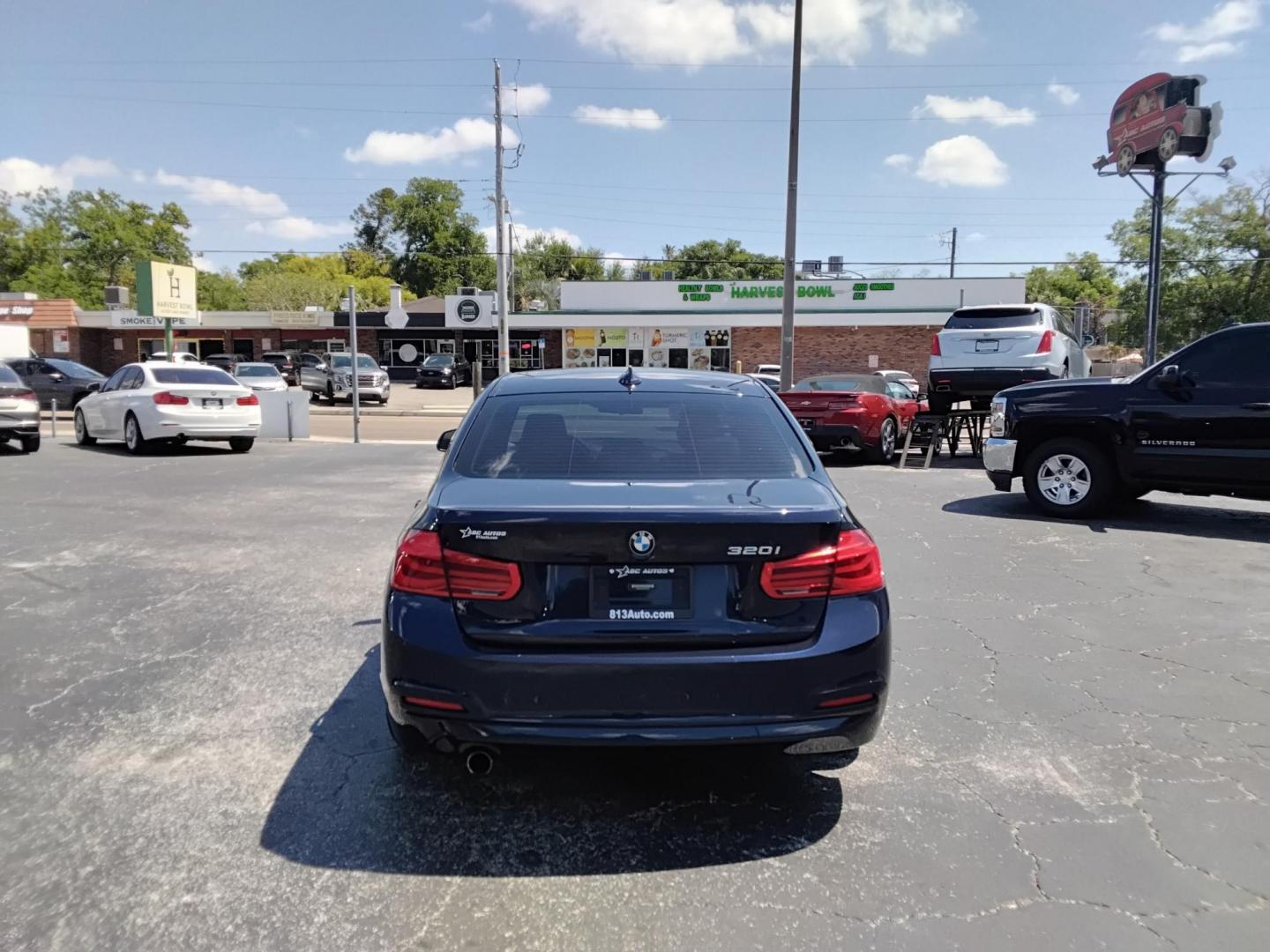 2017 BLUE /Beige BMW 3-Series 320i Sedan (WBA8A9C35HA) with an 2.0L L4 DOHC 16V engine, 8A transmission, located at 6112 N Florida Avenue, Tampa, FL, 33604, (888) 521-5131, 27.954929, -82.459534 - $499 down plus tax & tag. - Photo#3