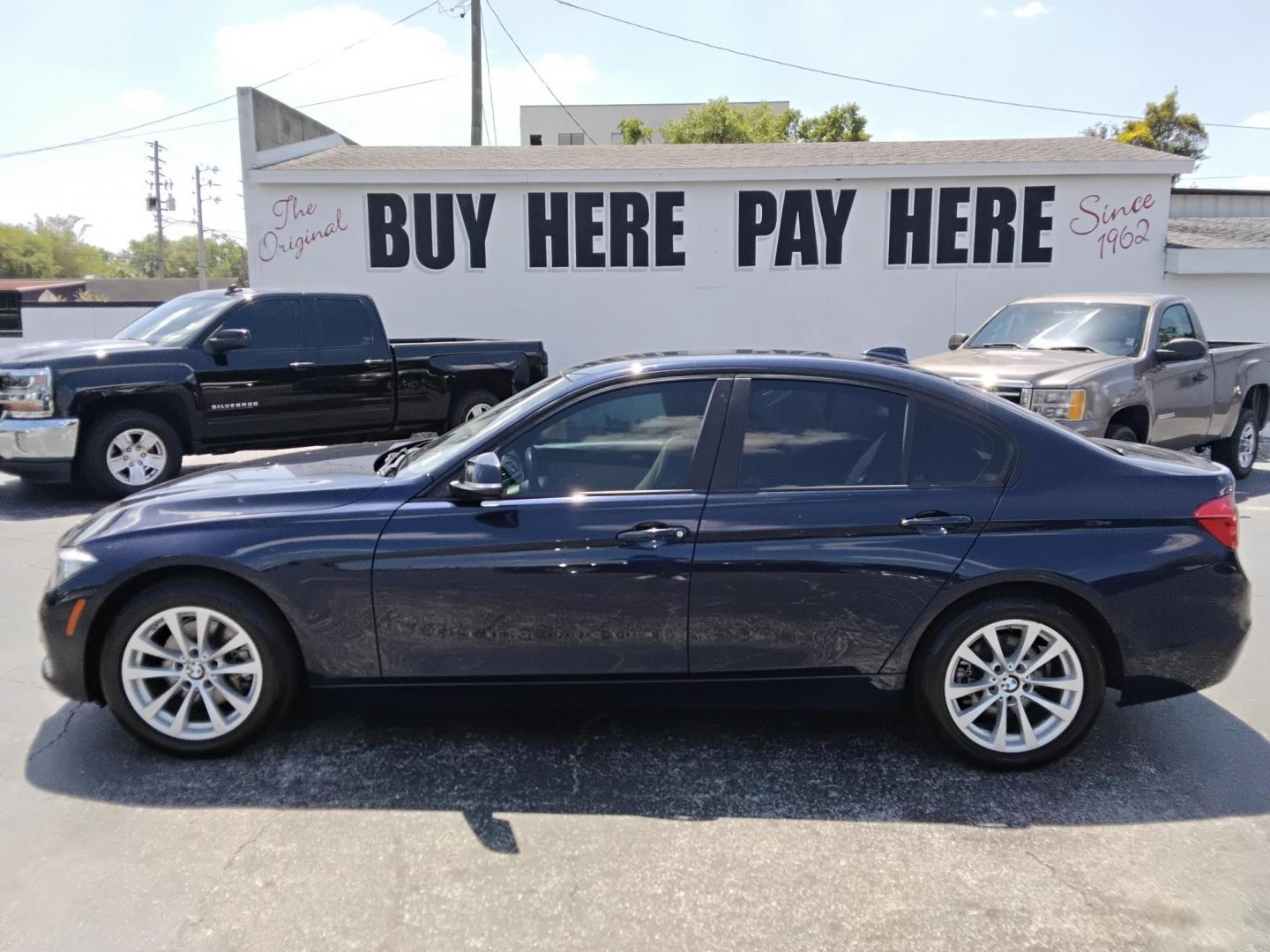 2017 BLUE /Beige BMW 3-Series 320i Sedan (WBA8A9C35HA) with an 2.0L L4 DOHC 16V engine, 8A transmission, located at 6112 N Florida Avenue, Tampa, FL, 33604, (888) 521-5131, 27.954929, -82.459534 - $499 down plus tax & tag. - Photo#0
