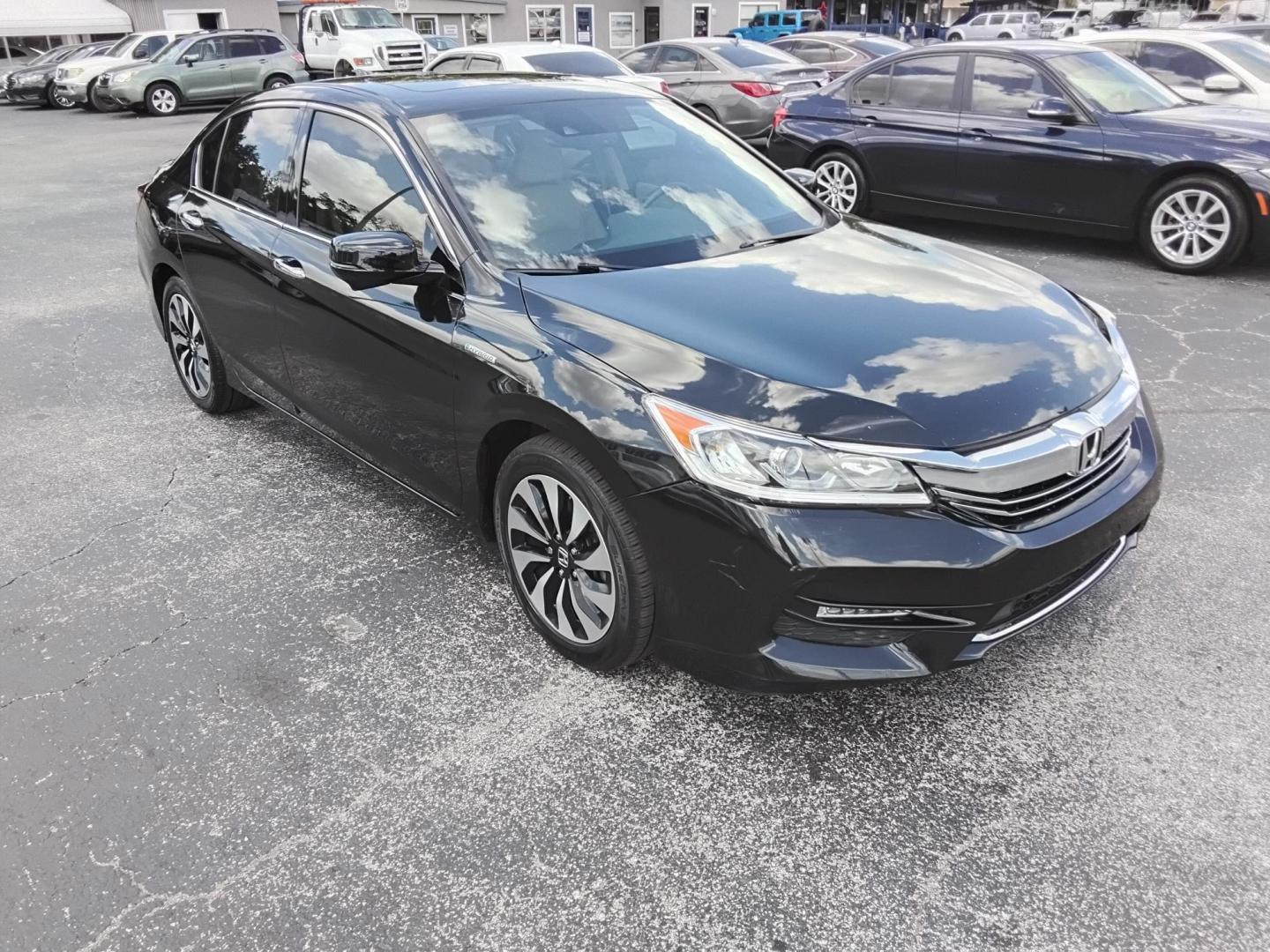 2017 BLACK /Beige Honda Accord Hybrid EX-L (JHMCR6F59HC) with an 2.0L L4 DOHC 16V HYBRID engine, CVT transmission, located at 6112 N Florida Avenue, Tampa, FL, 33604, (888) 521-5131, 27.954929, -82.459534 - $499 down plus tax & tag. - Photo#3
