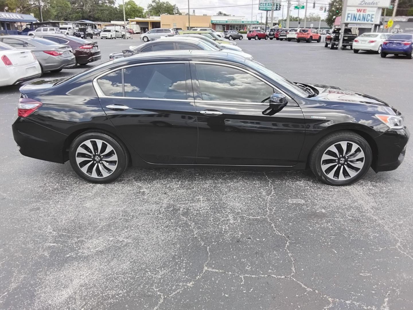 2017 BLACK /Beige Honda Accord Hybrid EX-L (JHMCR6F59HC) with an 2.0L L4 DOHC 16V HYBRID engine, CVT transmission, located at 6112 N Florida Avenue, Tampa, FL, 33604, (888) 521-5131, 27.954929, -82.459534 - $499 down plus tax & tag. - Photo#4