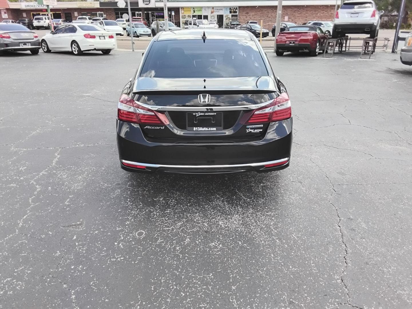 2017 BLACK /Beige Honda Accord Hybrid EX-L (JHMCR6F59HC) with an 2.0L L4 DOHC 16V HYBRID engine, CVT transmission, located at 6112 N Florida Avenue, Tampa, FL, 33604, (888) 521-5131, 27.954929, -82.459534 - $499 down plus tax & tag. - Photo#7