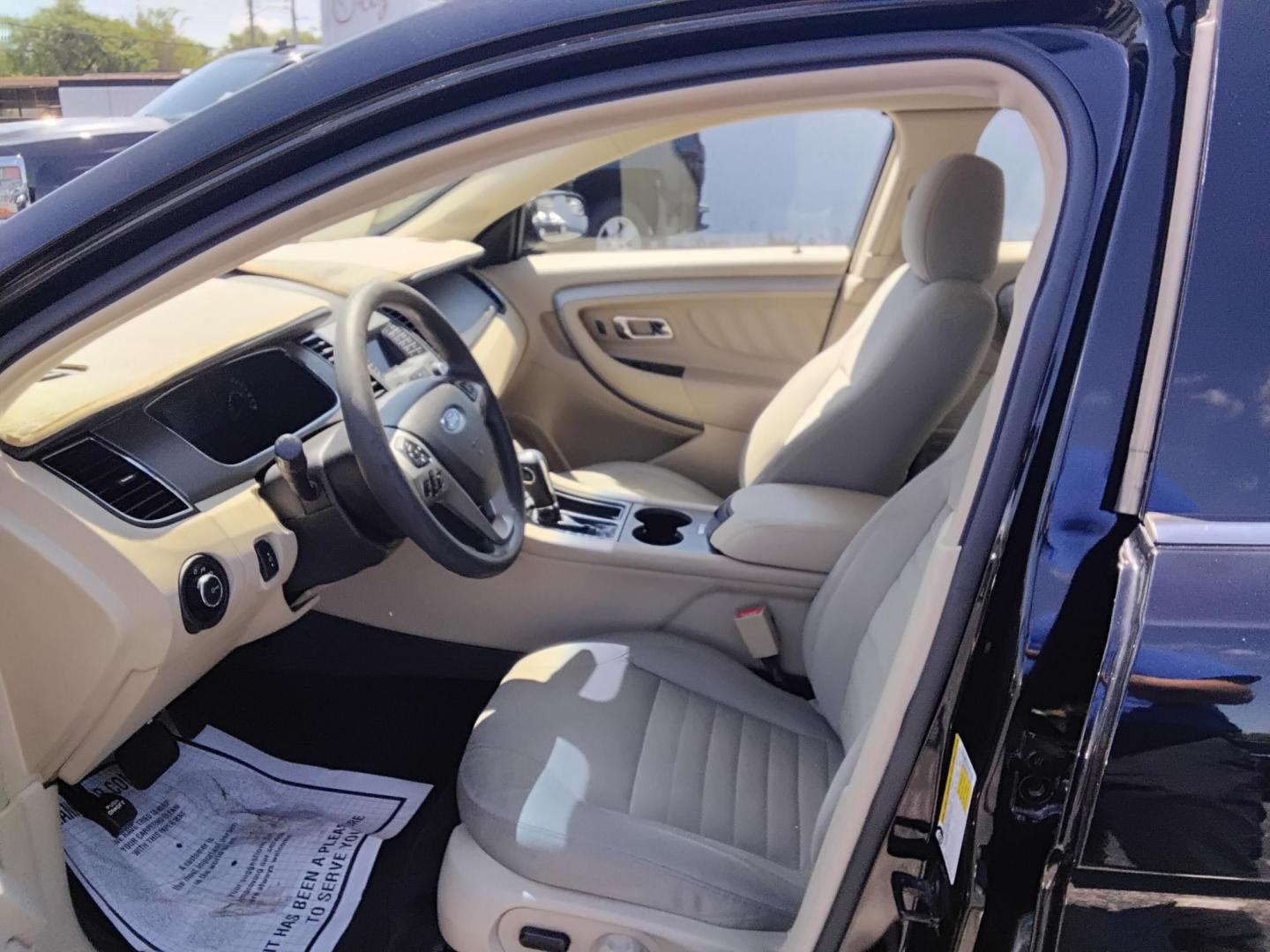 2017 BLACK /Beige Ford Taurus SE FWD (1FAHP2D85HG) with an 3.5L V6 DOHC 24V engine, 6A transmission, located at 6112 N Florida Avenue, Tampa, FL, 33604, (888) 521-5131, 27.954929, -82.459534 - $499 down plus tax & tag. - Photo#8