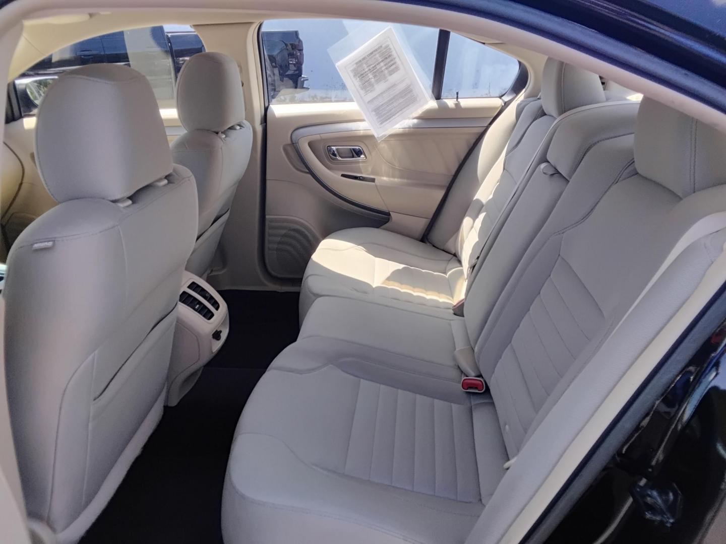 2017 BLACK /Beige Ford Taurus SE FWD (1FAHP2D85HG) with an 3.5L V6 DOHC 24V engine, 6A transmission, located at 6112 N Florida Avenue, Tampa, FL, 33604, (888) 521-5131, 27.954929, -82.459534 - $499 down plus tax & tag. - Photo#9