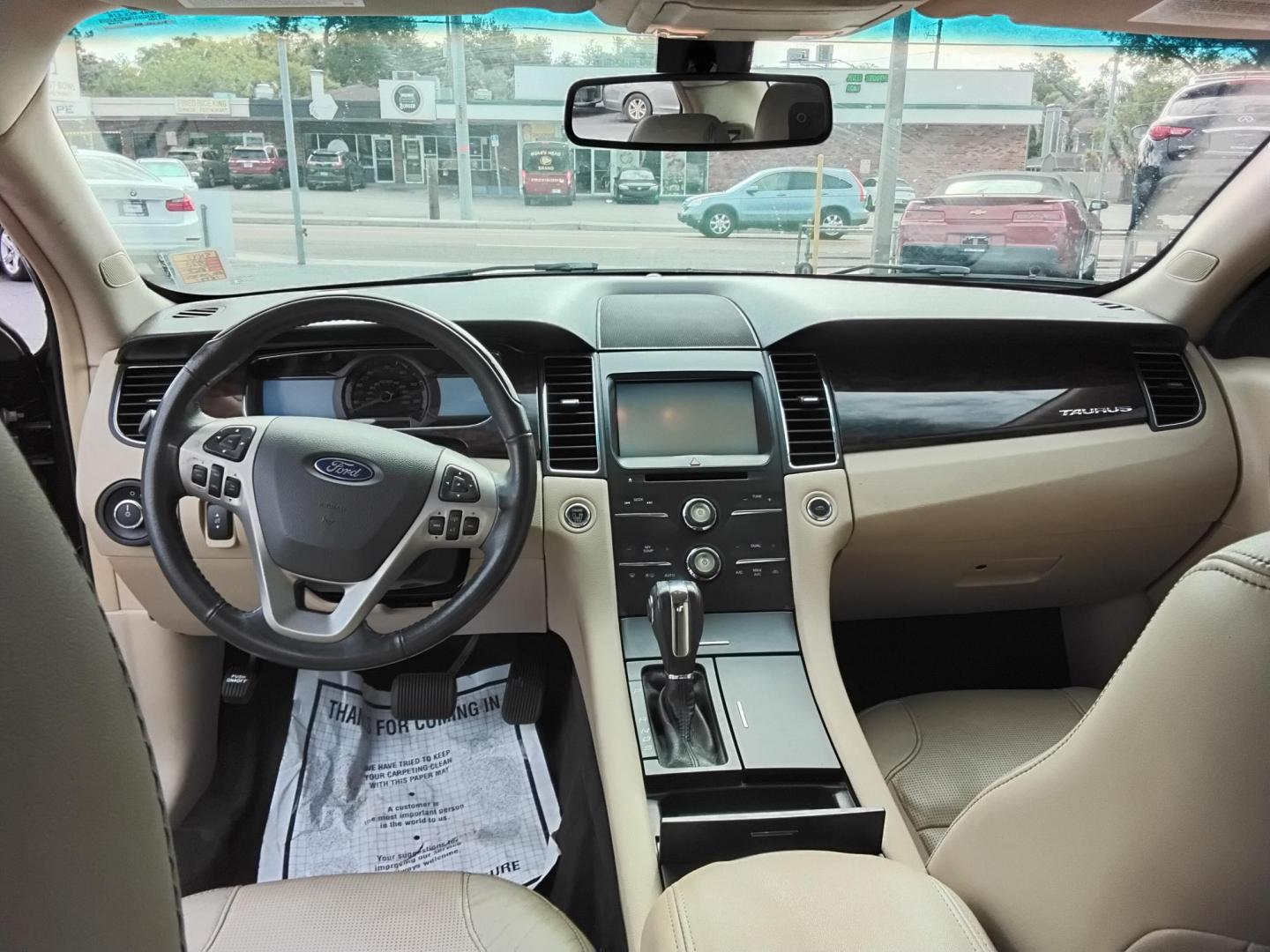 2015 BLACK /Beige Ford Taurus Limited FWD (1FAHP2F80FG) with an 3.5L V6 DOHC 24V engine, 6-Speed Automatic transmission, located at 6112 N Florida Avenue, Tampa, FL, 33604, (888) 521-5131, 27.954929, -82.459534 - $499 DOWN PLUS TAX & TAG. - Photo#7