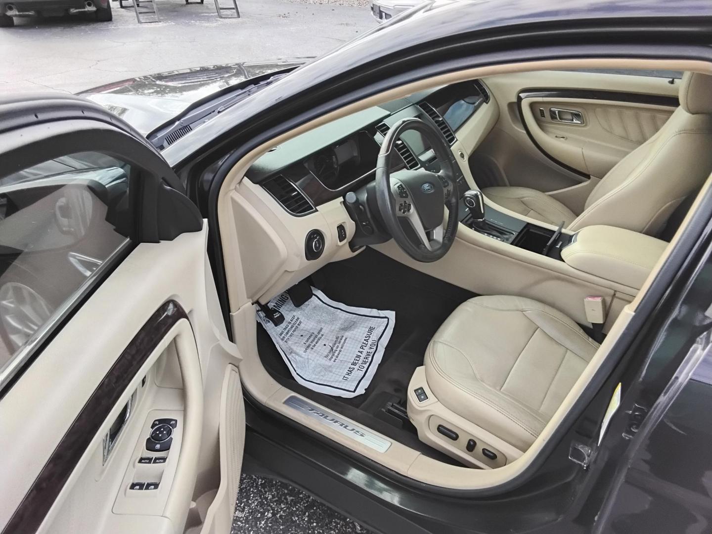 2015 BLACK /Beige Ford Taurus Limited FWD (1FAHP2F80FG) with an 3.5L V6 DOHC 24V engine, 6-Speed Automatic transmission, located at 6112 N Florida Avenue, Tampa, FL, 33604, (888) 521-5131, 27.954929, -82.459534 - $499 DOWN PLUS TAX & TAG. - Photo#8