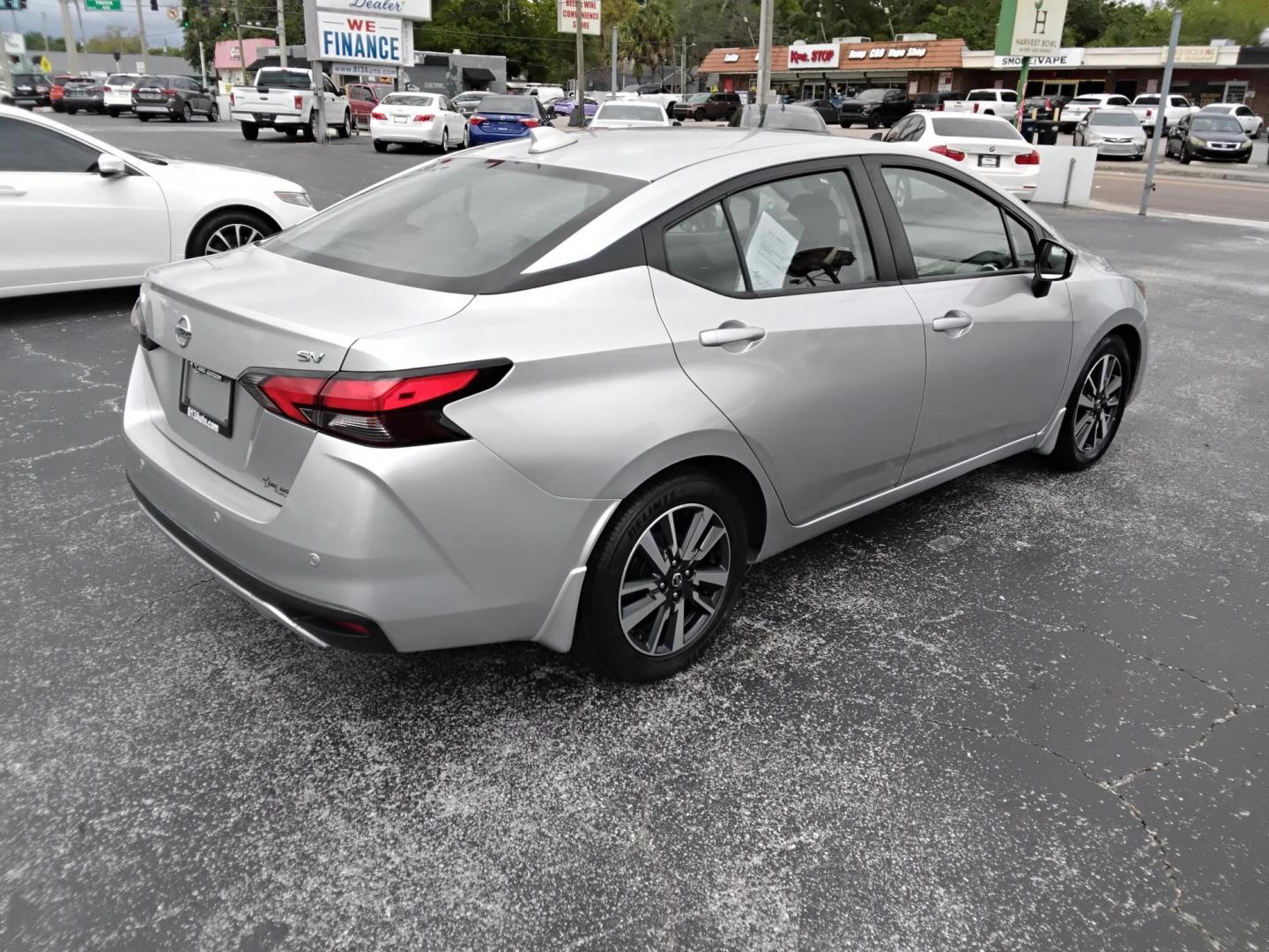 2020 SILVER /Grey Nissan Versa SV (3N1CN8EV6LL) with an 1.6L L4 DOHC 16V engine, CVT transmission, located at 6112 N Florida Avenue, Tampa, FL, 33604, (888) 521-5131, 27.954929, -82.459534 - $499 DOWN PLUS TAX & TAG. - Photo#4