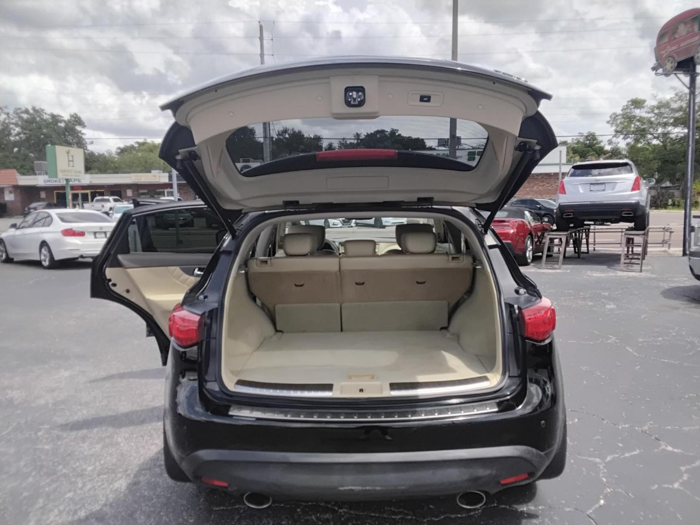2012 BLACK /Beige Infiniti FX FX35 2WD (JN8AS1MU8CM) with an 3.5L V6 DOHC 24V engine, 5-Speed Automatic transmission, located at 6112 N Florida Avenue, Tampa, FL, 33604, (888) 521-5131, 27.954929, -82.459534 - $499 DOWN PLUS TAX & TAG. - Photo#5