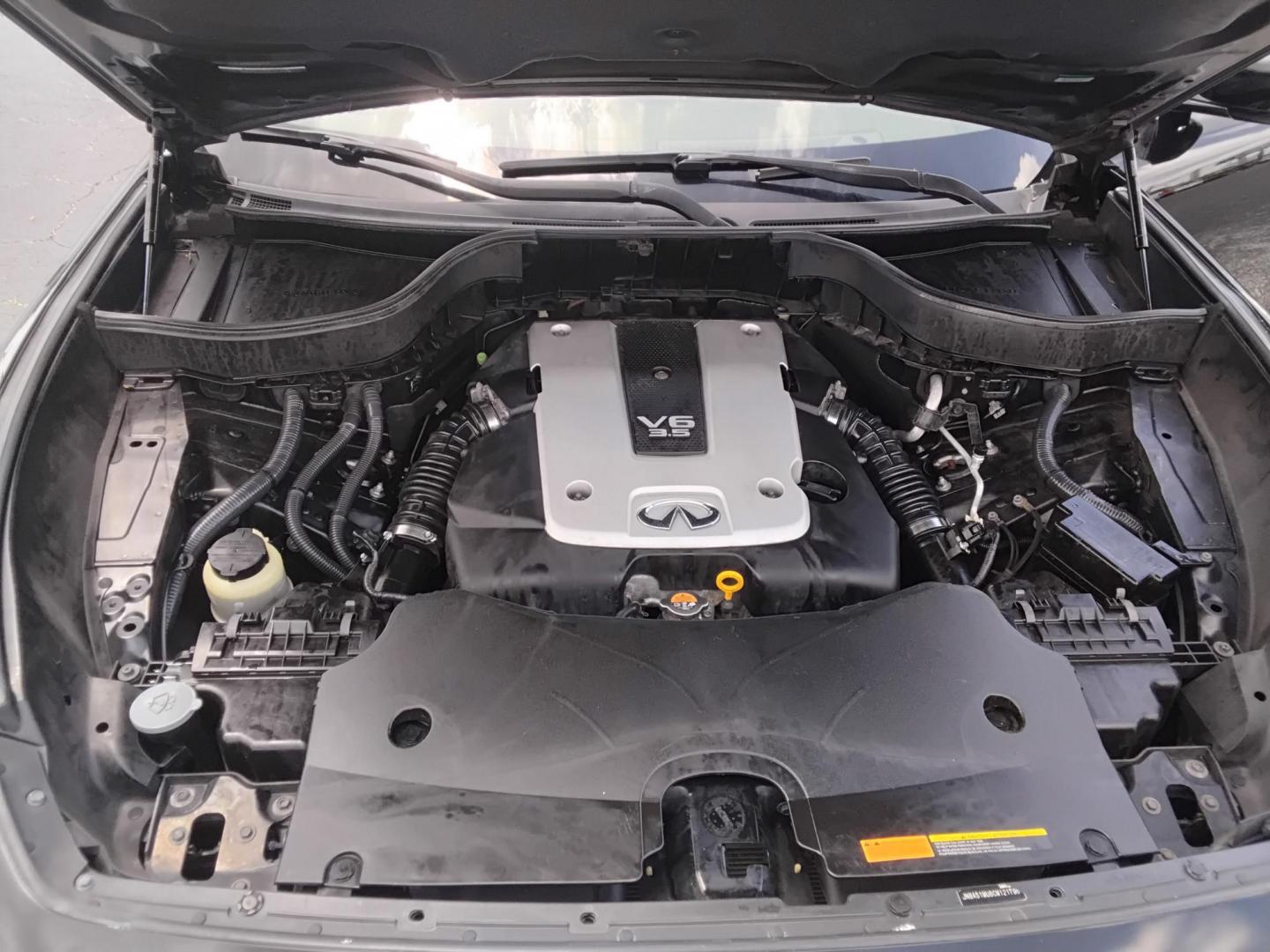 2012 BLACK /Beige Infiniti FX FX35 2WD (JN8AS1MU8CM) with an 3.5L V6 DOHC 24V engine, 5-Speed Automatic transmission, located at 6112 N Florida Avenue, Tampa, FL, 33604, (888) 521-5131, 27.954929, -82.459534 - $499 DOWN PLUS TAX & TAG. - Photo#9