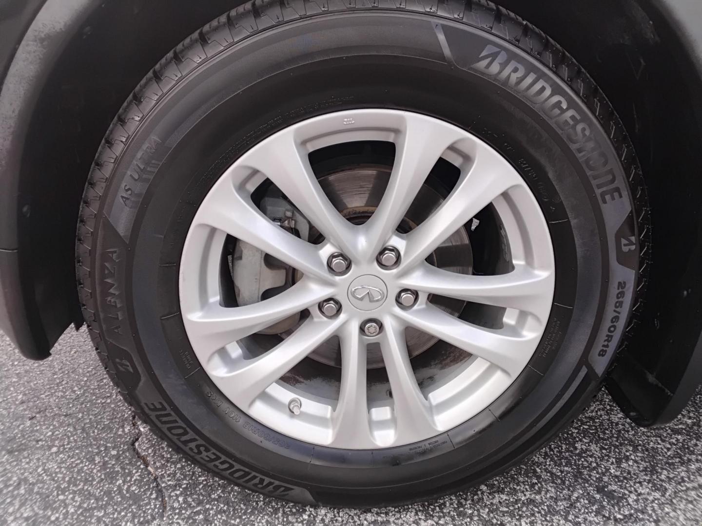 2012 BLACK /Beige Infiniti FX FX35 2WD (JN8AS1MU8CM) with an 3.5L V6 DOHC 24V engine, 5-Speed Automatic transmission, located at 6112 N Florida Avenue, Tampa, FL, 33604, (888) 521-5131, 27.954929, -82.459534 - $499 DOWN PLUS TAX & TAG. - Photo#10