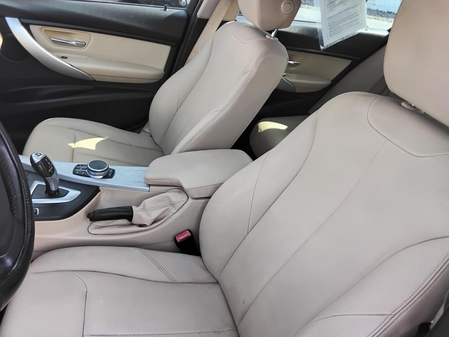 2018 BLACK /Beige BMW 3-Series 320i Sedan (WBA8A9C58JA) with an 2.0L L4 DOHC 16V engine, 8A transmission, located at 6112 N Florida Avenue, Tampa, FL, 33604, (888) 521-5131, 27.954929, -82.459534 - $499 DOWN PLUS TAX & TAG. - Photo#14