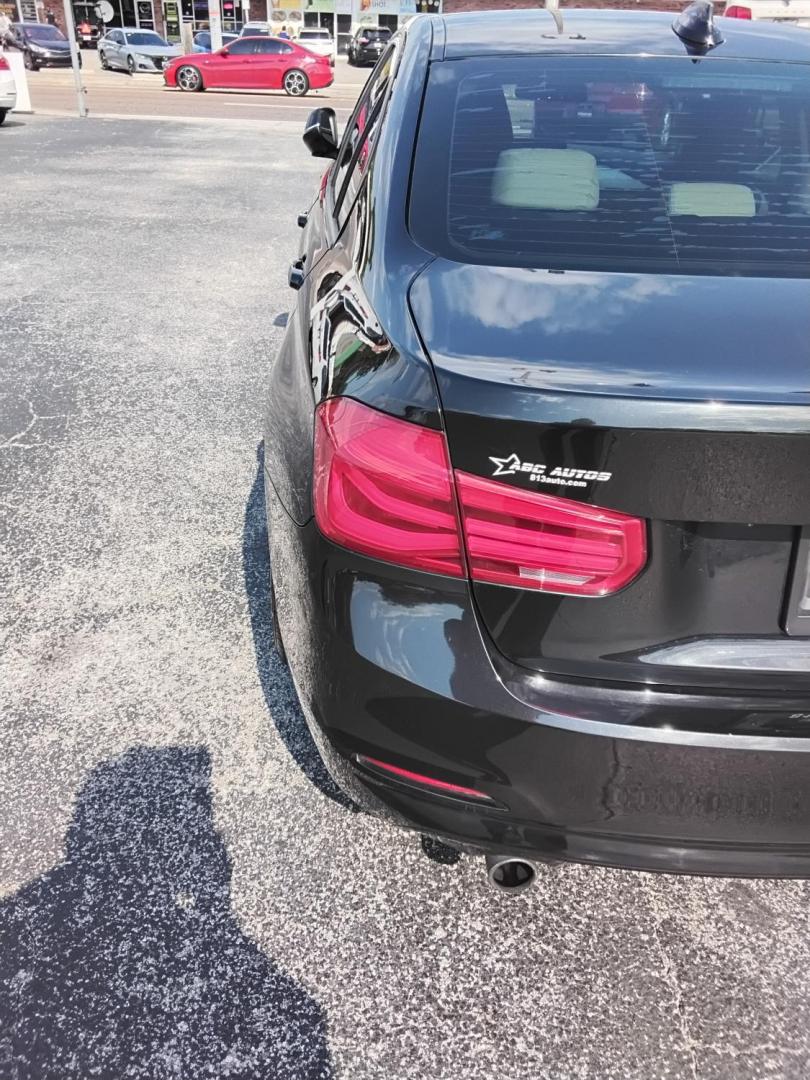 2018 BLACK /Beige BMW 3-Series 320i Sedan (WBA8A9C58JA) with an 2.0L L4 DOHC 16V engine, 8A transmission, located at 6112 N Florida Avenue, Tampa, FL, 33604, (888) 521-5131, 27.954929, -82.459534 - $499 DOWN PLUS TAX & TAG. - Photo#9