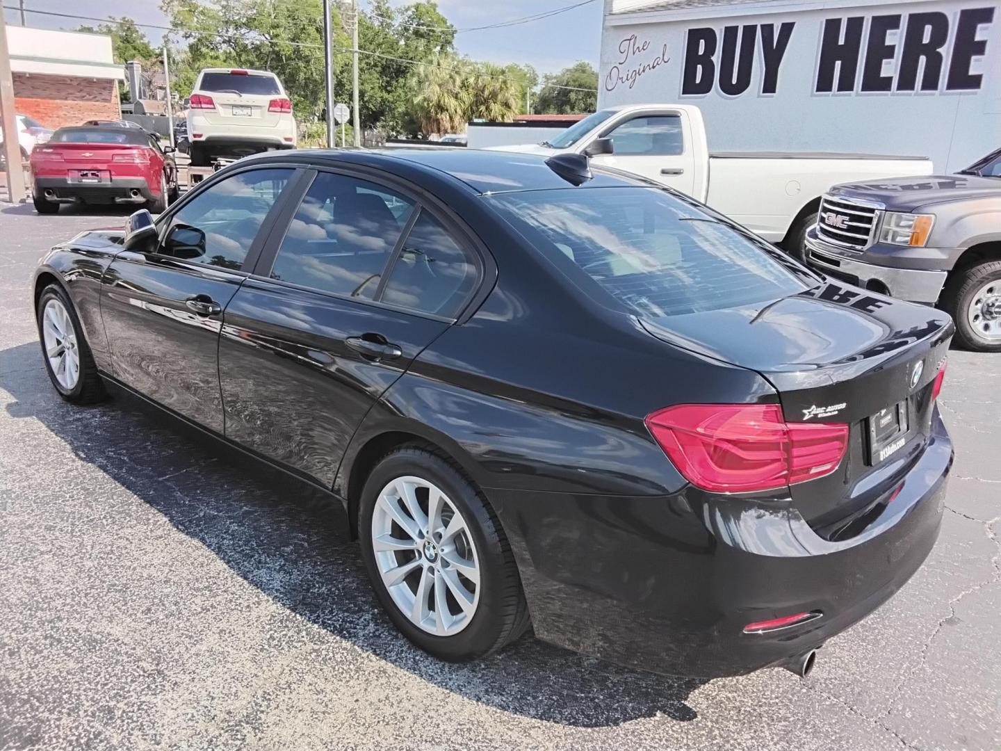 2018 BLACK /Beige BMW 3-Series 320i Sedan (WBA8A9C58JA) with an 2.0L L4 DOHC 16V engine, 8A transmission, located at 6112 N Florida Avenue, Tampa, FL, 33604, (888) 521-5131, 27.954929, -82.459534 - $499 DOWN PLUS TAX & TAG. - Photo#8