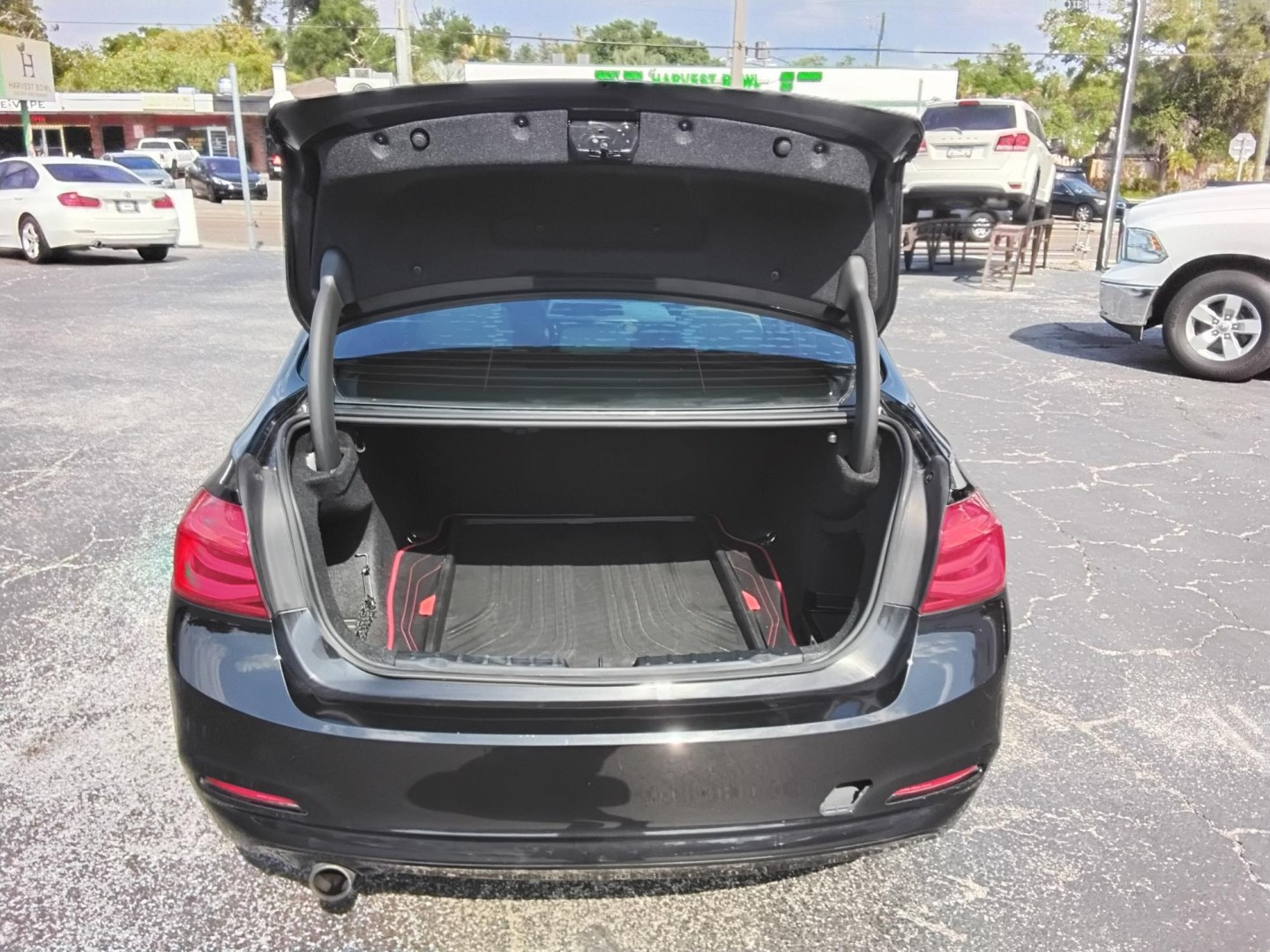 2018 BLACK /Beige BMW 3-Series 320i Sedan (WBA8A9C58JA) with an 2.0L L4 DOHC 16V engine, 8A transmission, located at 6112 N Florida Avenue, Tampa, FL, 33604, (888) 521-5131, 27.954929, -82.459534 - $499 DOWN PLUS TAX & TAG.- Photo#13