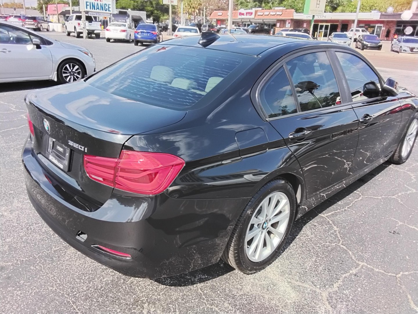 2018 BLACK /Beige BMW 3-Series 320i Sedan (WBA8A9C58JA) with an 2.0L L4 DOHC 16V engine, 8A transmission, located at 6112 N Florida Avenue, Tampa, FL, 33604, (888) 521-5131, 27.954929, -82.459534 - $499 DOWN PLUS TAX & TAG.- Photo#12
