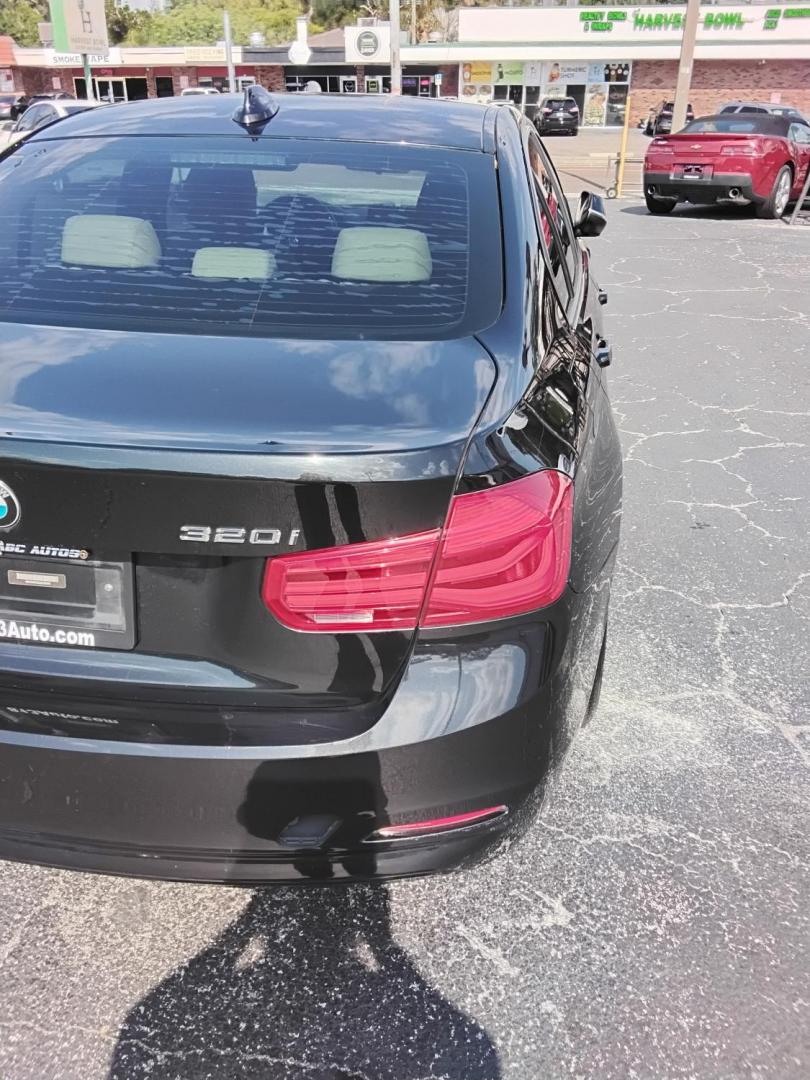 2018 BLACK /Beige BMW 3-Series 320i Sedan (WBA8A9C58JA) with an 2.0L L4 DOHC 16V engine, 8A transmission, located at 6112 N Florida Avenue, Tampa, FL, 33604, (888) 521-5131, 27.954929, -82.459534 - $499 DOWN PLUS TAX & TAG. - Photo#10